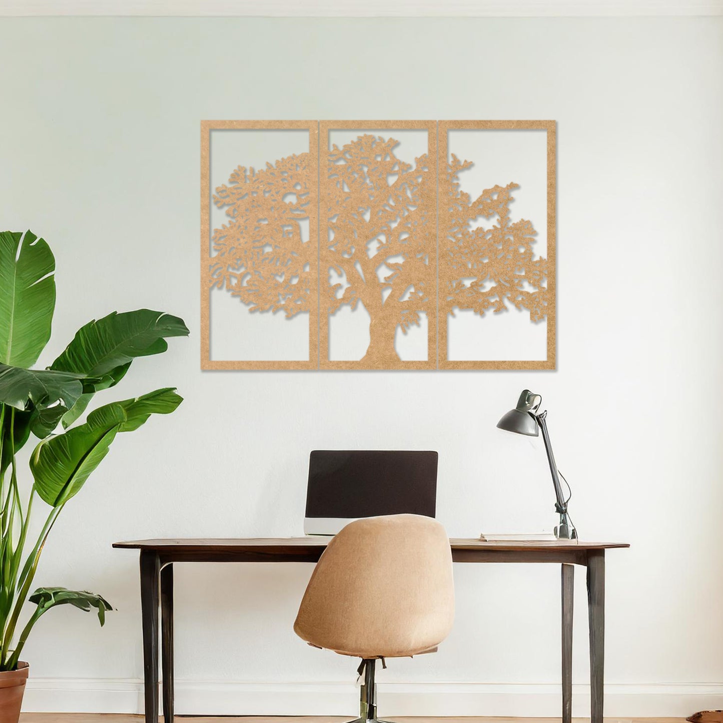 Wooden wall art in three panels depicting a detailed tree design with intricate branches, set on a neutral wall within modern room decor, highlighting its natural and artistic aesthetic.