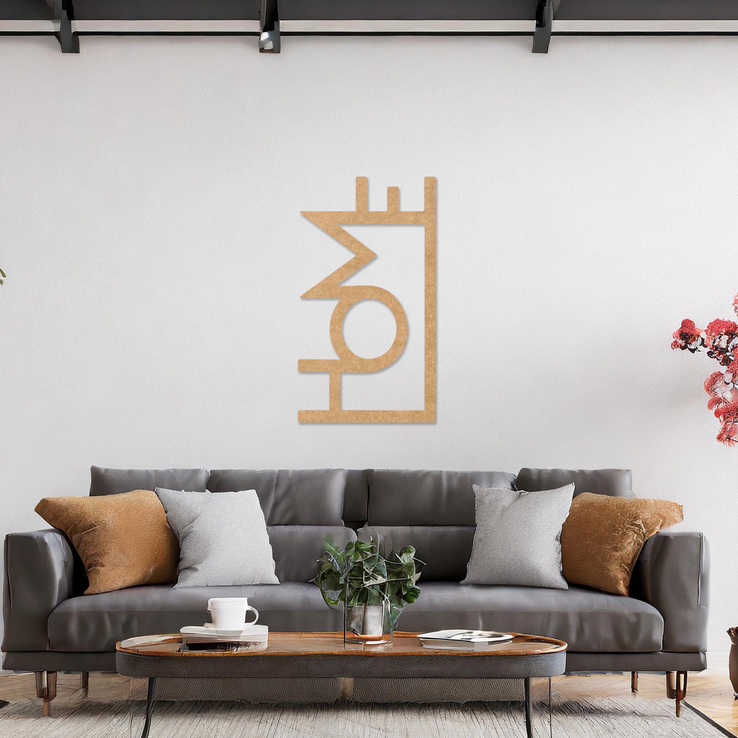 Wall art featuring the word "HOME" in a bold, modern design with geometric shapes integrated into the lettering. The piece is displayed on a neutral wall within contemporary room decor, adding a stylish and welcoming touch to the space.