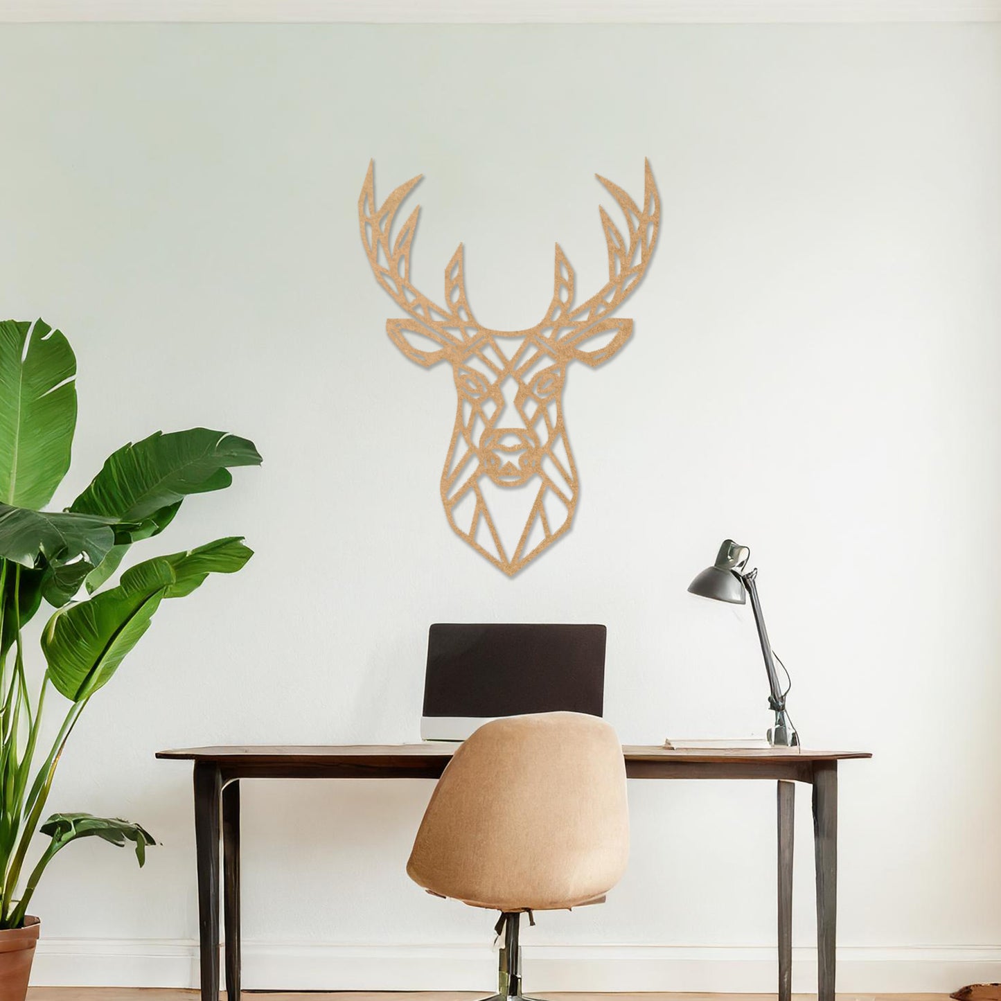 Wooden wall art featuring a geometric deer head design with intricate antlers, displayed on a neutral wall within modern room decor, showcasing its bold and contemporary artistic style.