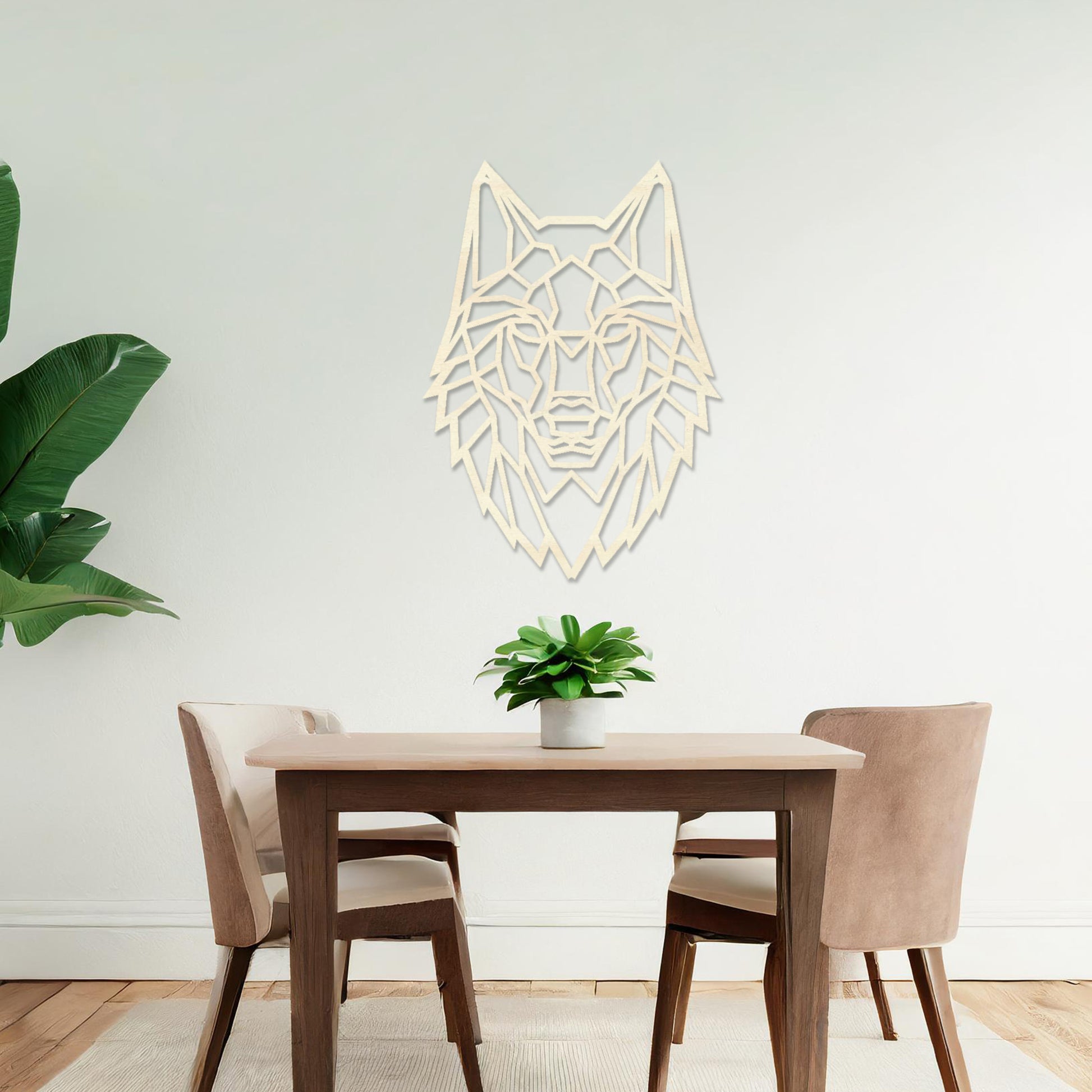 Wooden wall art featuring a geometric wolf design with sharp, angular lines. The artwork is displayed on a neutral wall within modern room decor, drawing attention to its bold and intricate pattern.