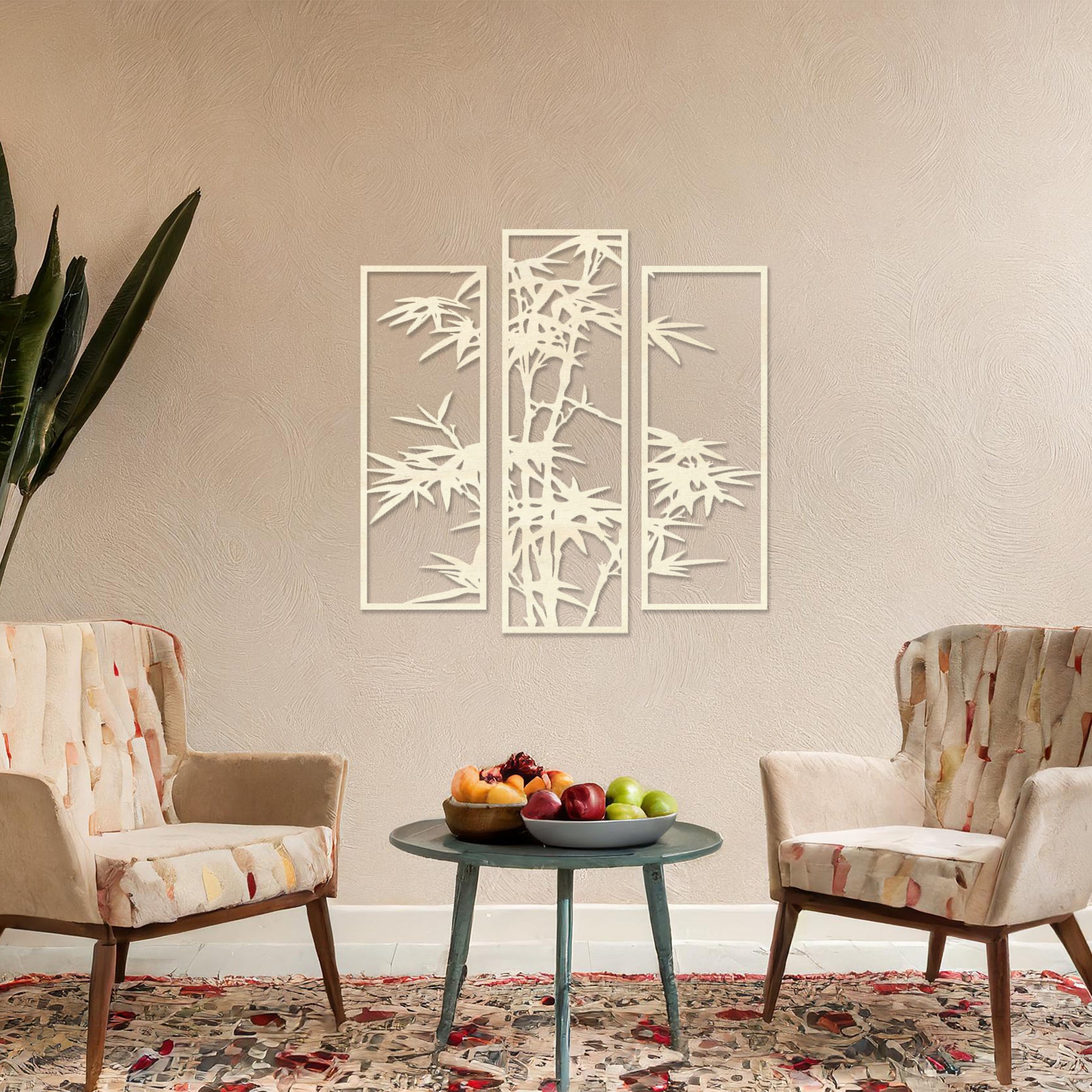 Wooden wall art consisting of three panels featuring a bamboo design with detailed leaves and stalks, displayed on a neutral wall within modern room decor, highlighting its elegant and nature-inspired craftsmanship.