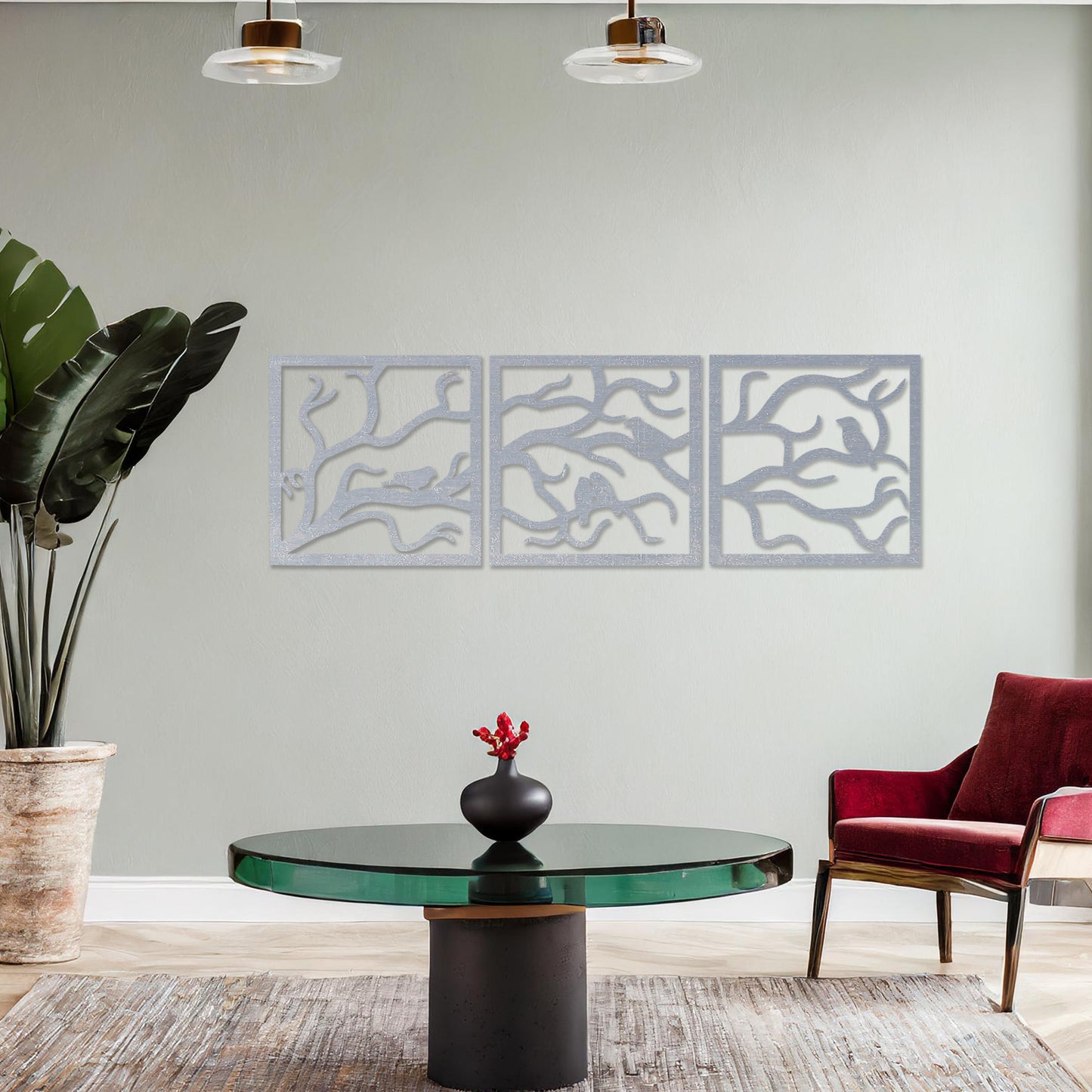 A three-panel wall art showcasing a design of birds perched on delicate tree branches. The intricate artwork is displayed on a neutral wall in a modern room, enhancing the natural and elegant ambiance of the decor.