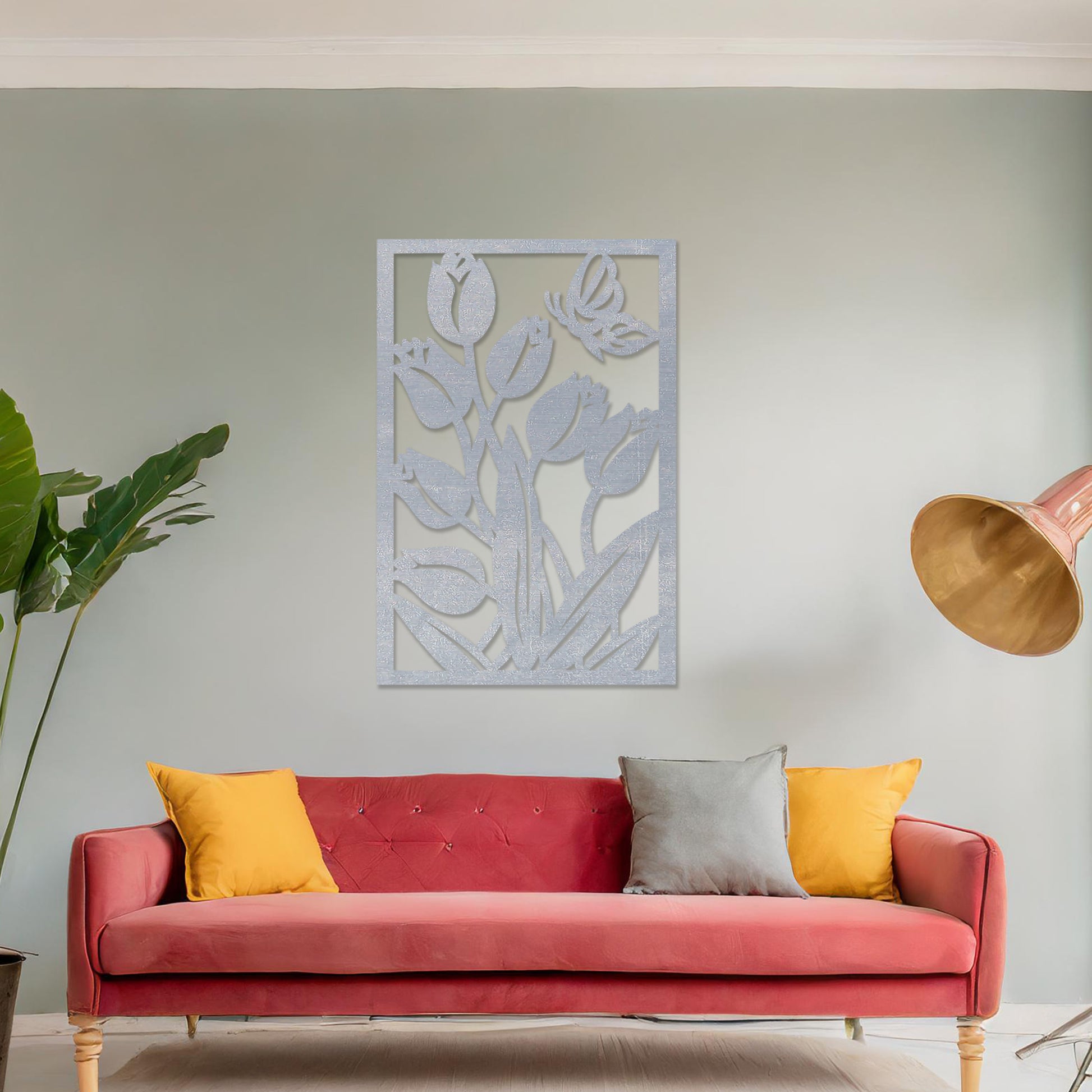Wooden wall art design featuring tulips with a butterfly, framed in a rectangular shape, placed on a neutral wall within modern room decor. The design captures the beauty of nature with detailed plant and insect motifs.