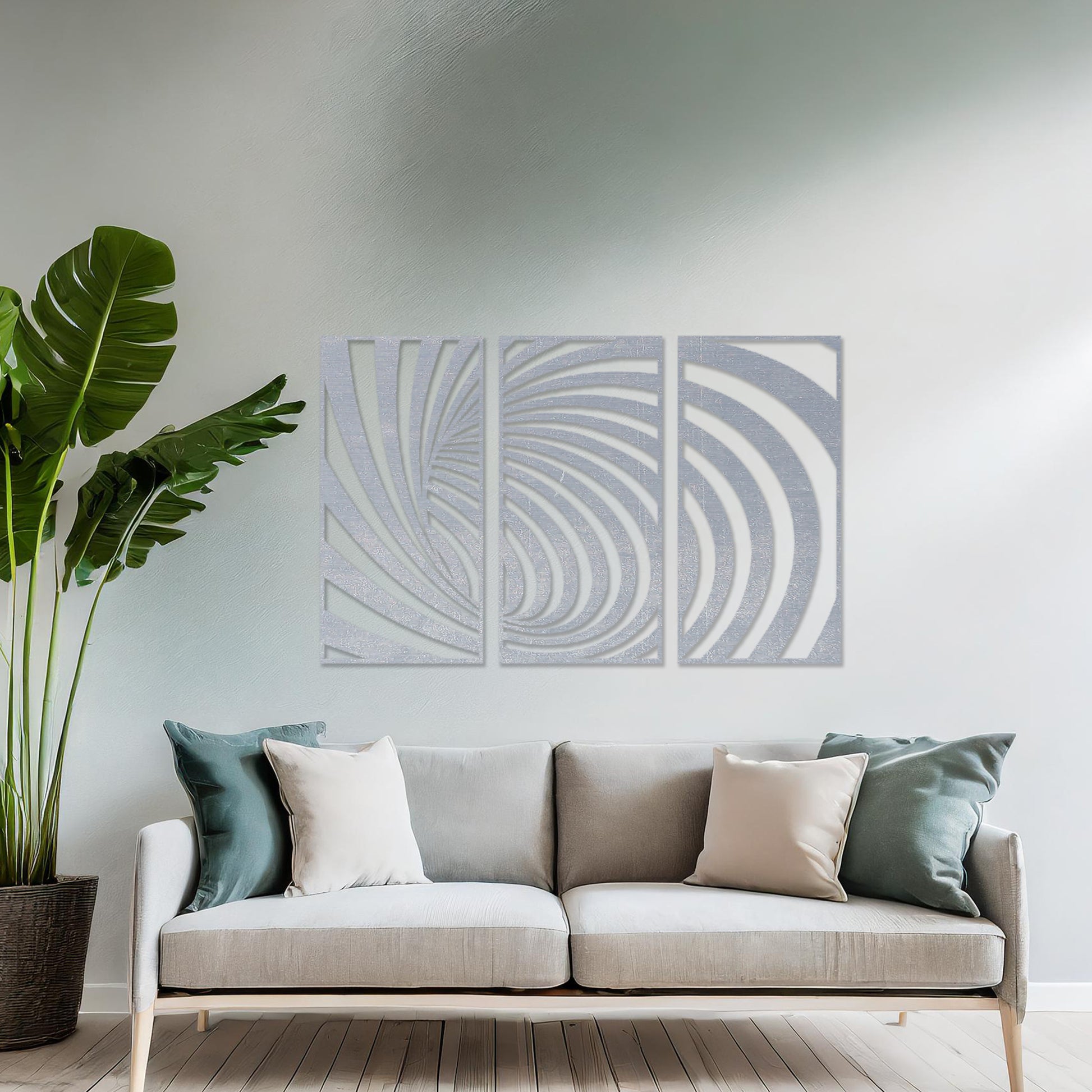 Wooden wall art comprising three panels with an abstract spiral design, displayed on a neutral wall within modern room decor, highlighting its bold and contemporary artistic craftsmanship.