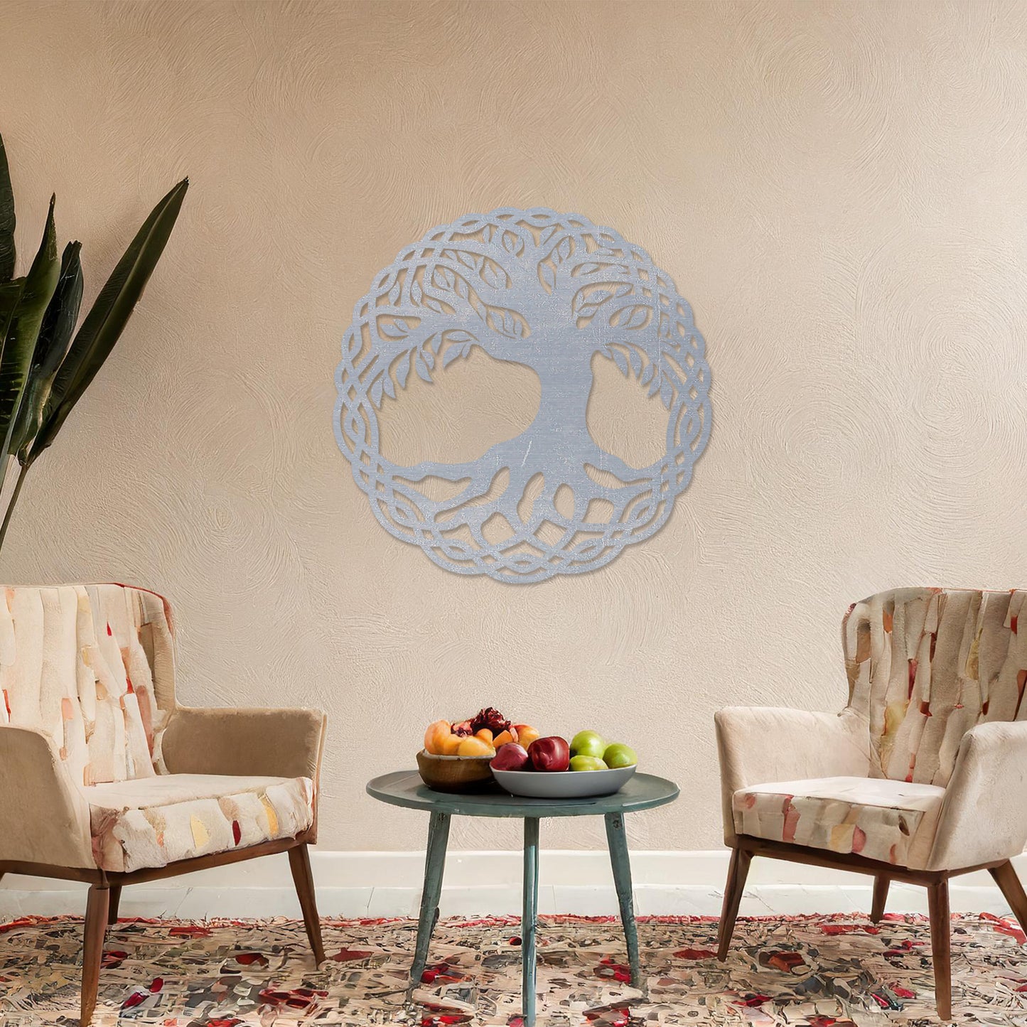 Wooden wall art featuring a circular tree of life design with intertwined roots and branches, displayed on a neutral wall within modern room decor, highlighting its symbolic and intricate craftsmanship.
