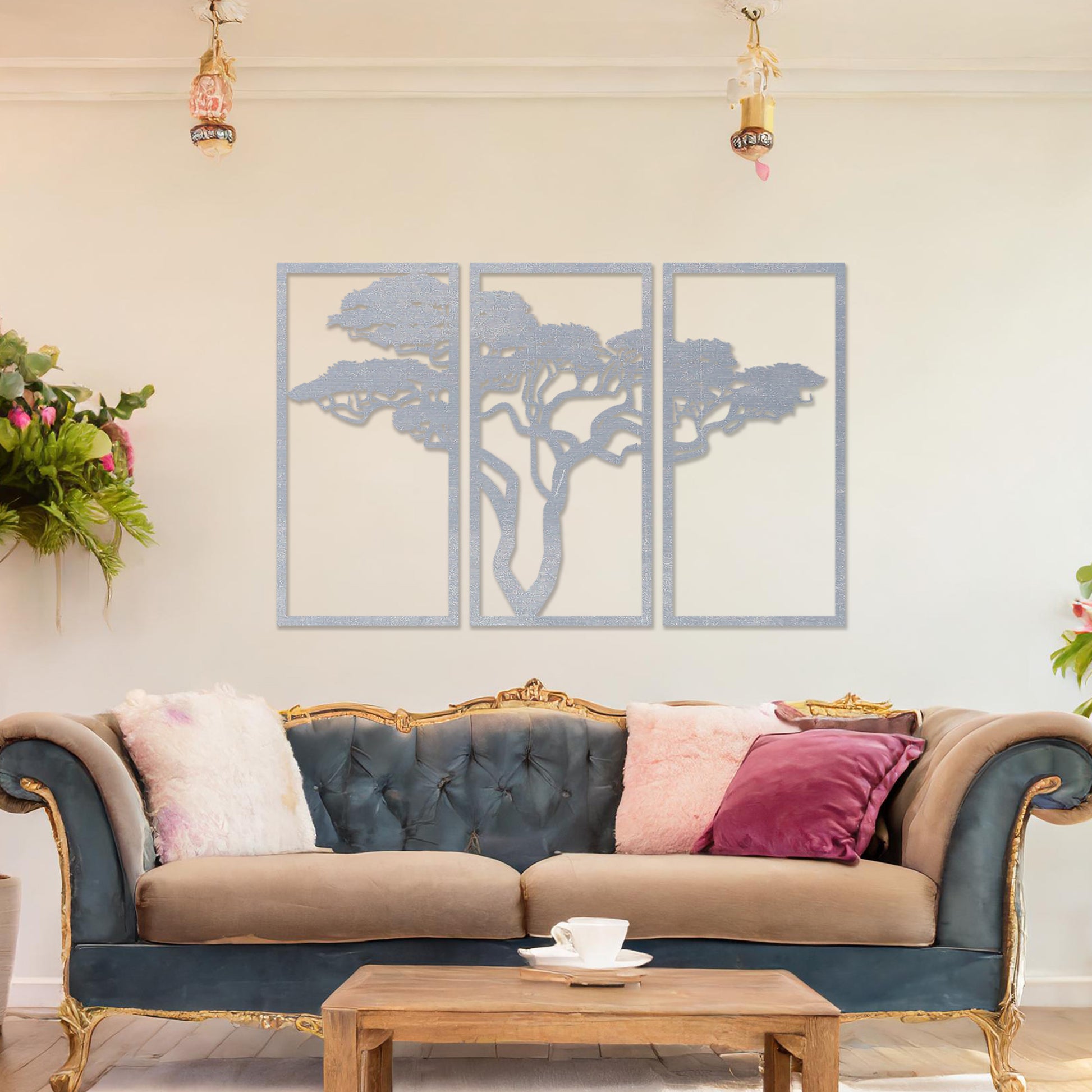 Three-panel wooden wall art featuring an elegant silhouette of a tree with spreading branches, displayed on a neutral wall within modern room decor. The intricate design adds depth and sophistication to the space.