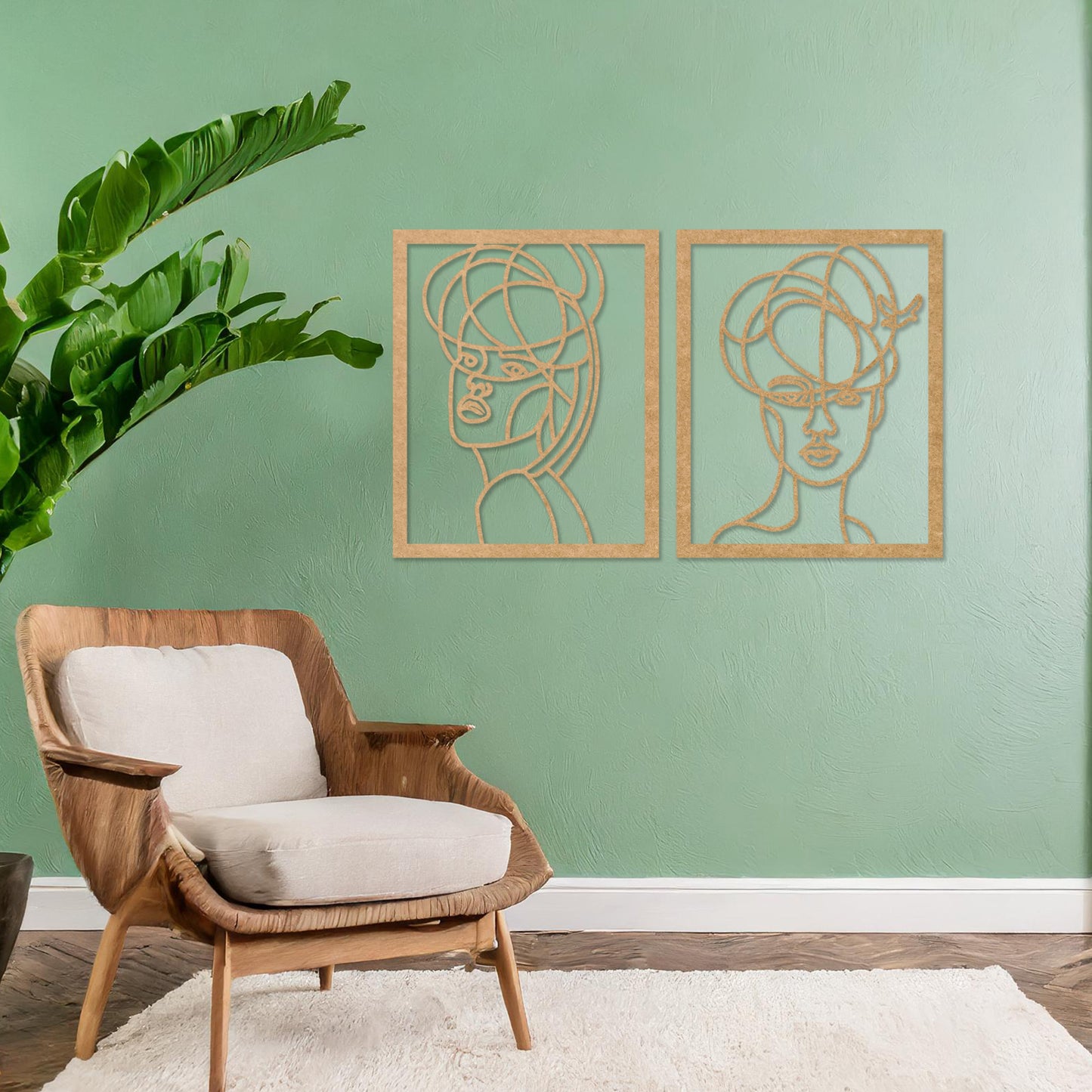 Wooden wall art set featuring two abstract face designs with artistic lines, capturing modern and minimalist elegance, placed on a neutral wall within a contemporary room decor, showcasing creativity and sophistication.