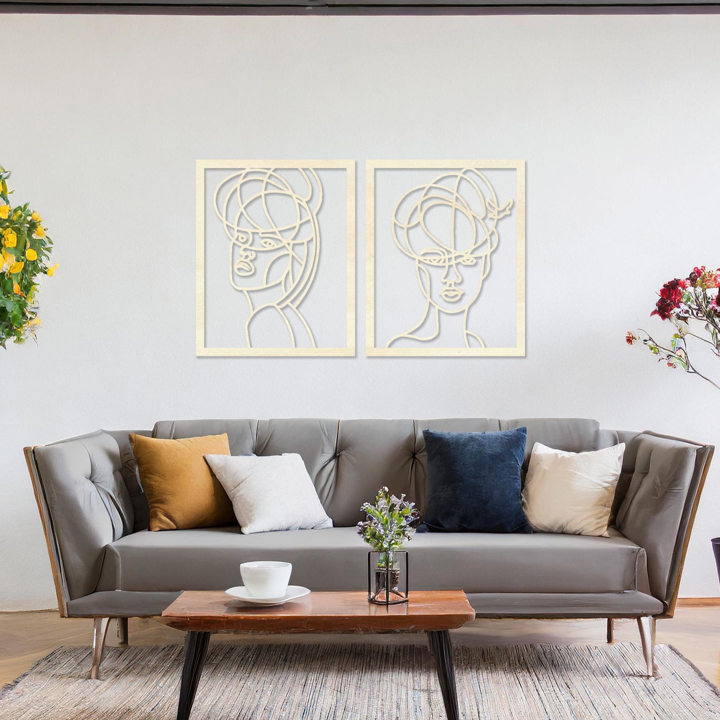 Wooden wall art set featuring two abstract face designs with artistic lines, capturing modern and minimalist elegance, placed on a neutral wall within a contemporary room decor, showcasing creativity and sophistication.
