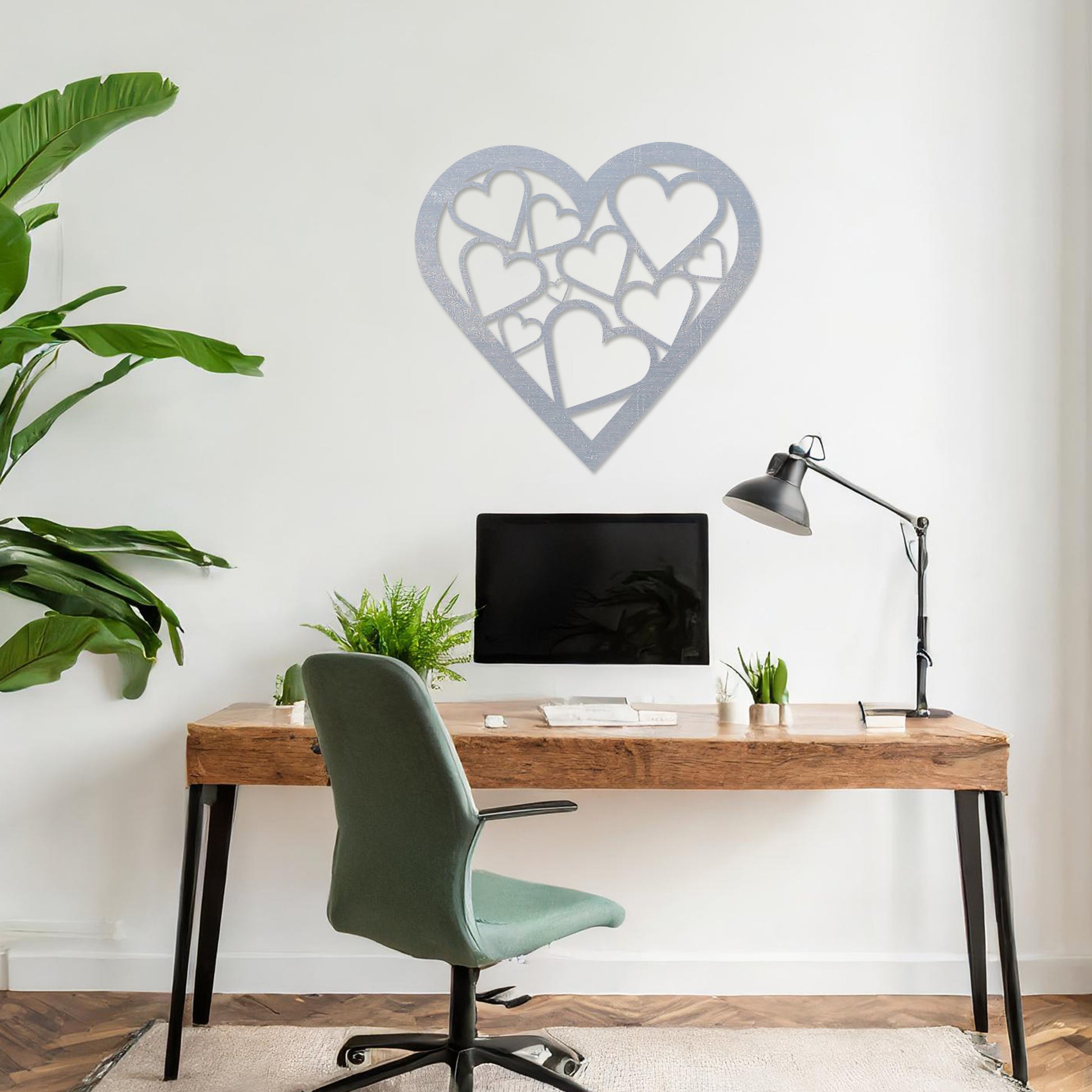 Wooden heart wall art featuring a cluster of interconnected heart shapes, placed on a neutral wall within modern room decor, highlighting its romantic and artistic design, ideal for adding charm to the space.