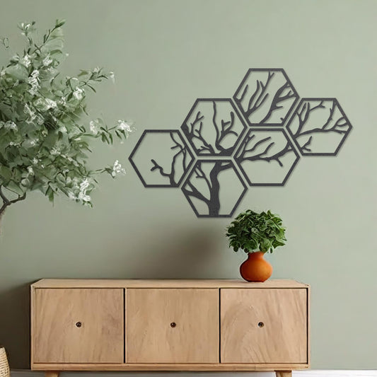 Wooden wall art showcasing a hexagonal pattern with an intricate tree branch design. Mounted on a neutral wall in a modern room decor, this geometric piece combines nature and contemporary artistry, creating a visually engaging focal point.