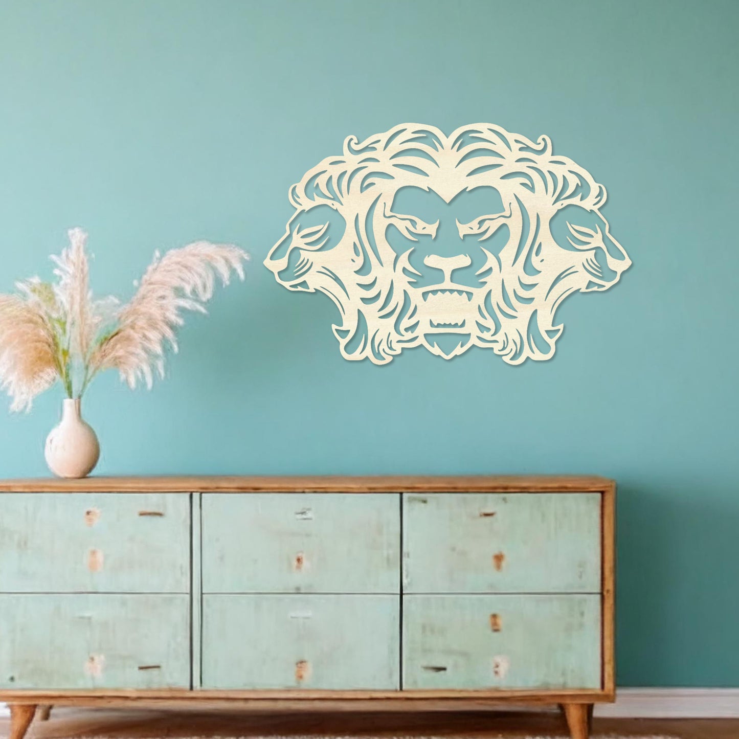 Wooden wall art featuring a striking design of three lions, with the central lion in a roaring pose and the two side profiles showcasing graceful expressions. Mounted on a neutral wall within modern decor, this piece adds a bold and regal statement to the room.