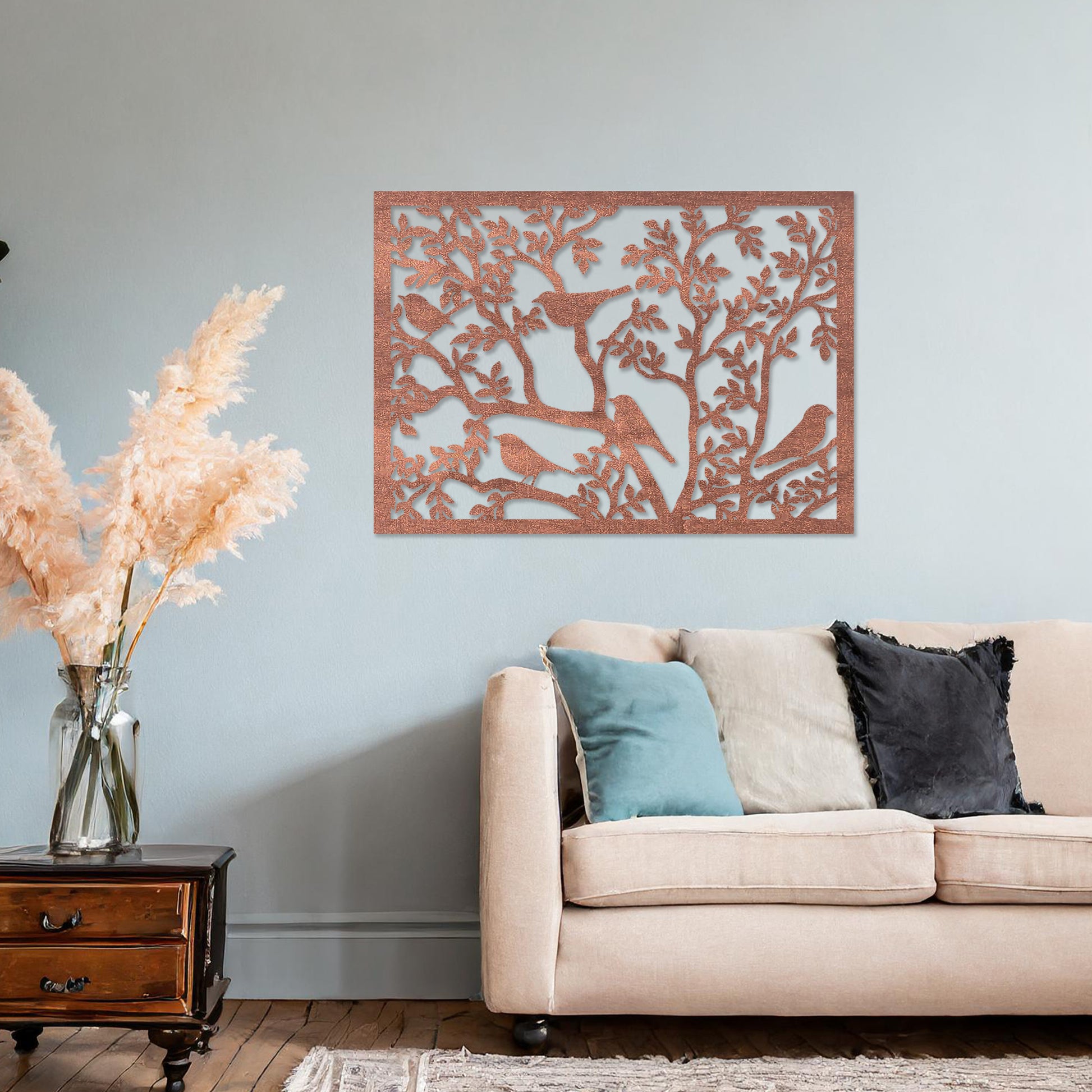 Wooden wall art showcasing a detailed scene of birds perched on intricately designed tree branches. The design highlights nature's charm, placed on a neutral wall within modern room decor, creating an inviting and tranquil atmosphere.