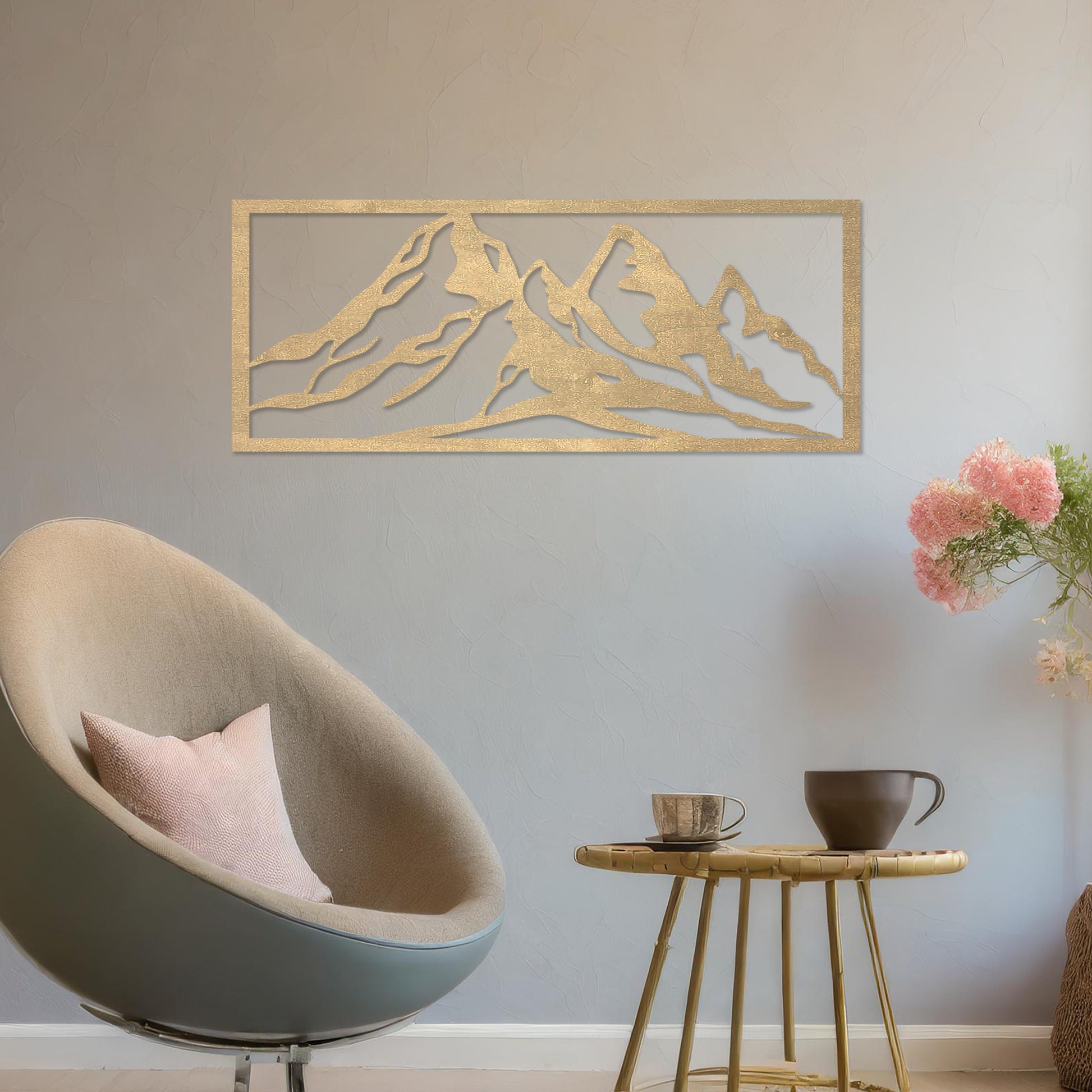 Wooden wall art featuring a stunning mountain range design, capturing the essence of natural landscapes. Set against a neutral wall in a modern decor setting, this artwork adds depth and serenity to the room's atmosphere.