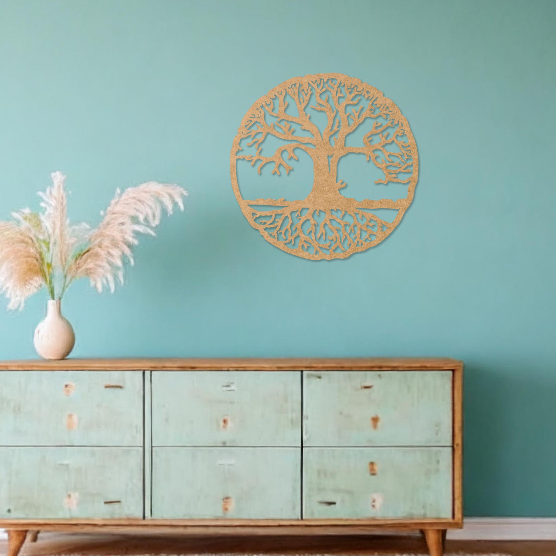 Round wooden wall art featuring an intricate tree design with sprawling branches and roots, symbolising connection and growth. Placed on a neutral wall in a modern room decor, this piece exudes a harmonious and earthy charm.