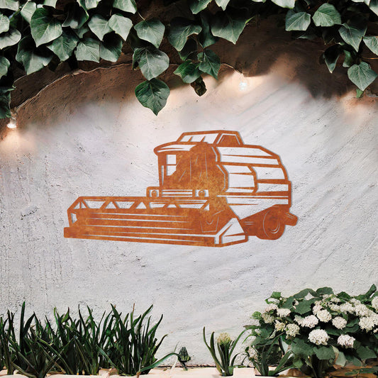 Metal wall art featuring a detailed illustration of a combine harvester, designed with bold lines and geometric shapes, ideal for those passionate about farming or agriculture.