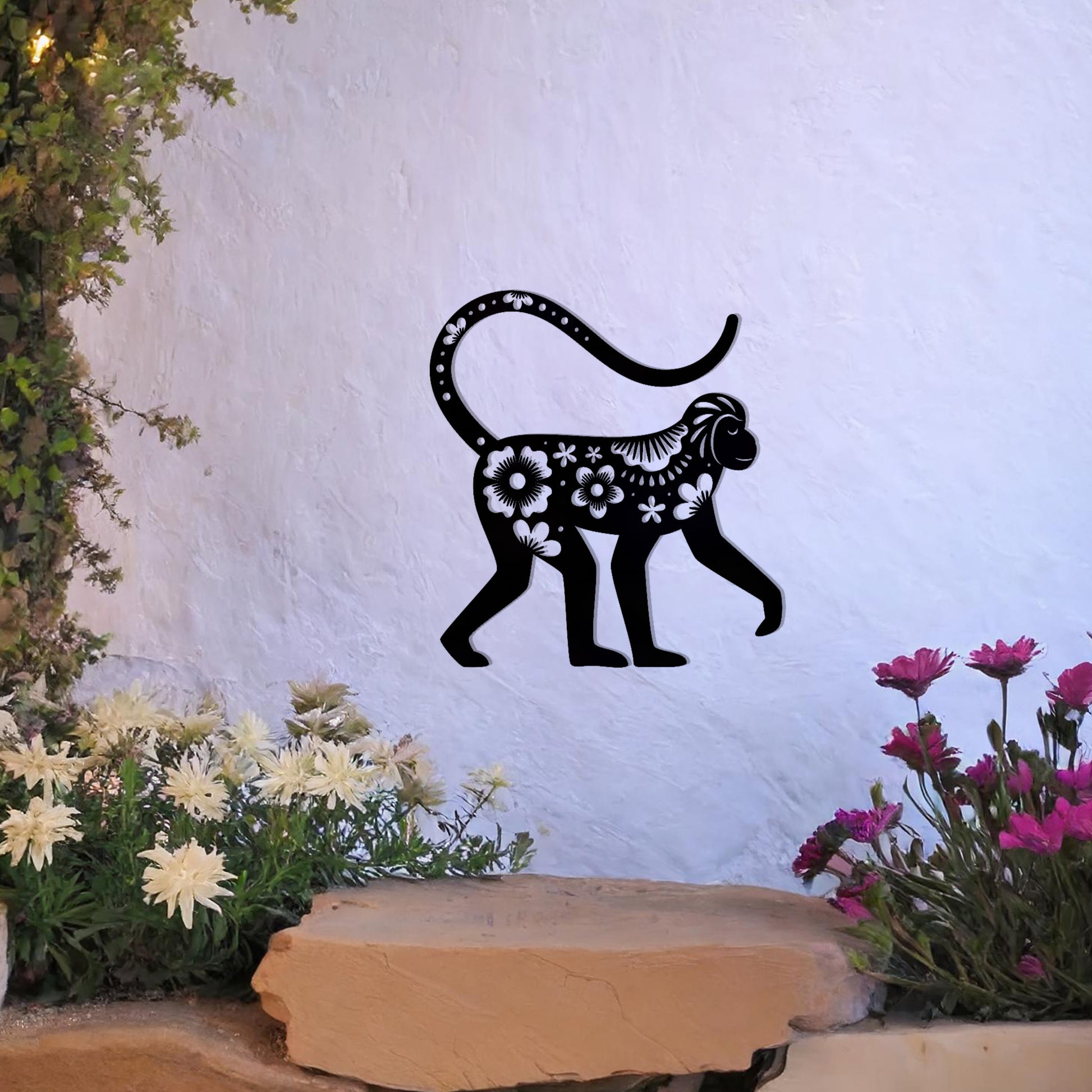 This design showcases a playful monkey adorned with floral patterns and intricate details. The artistic use of flowers and decorative elements within the silhouette gives the piece a whimsical and elegant charm, perfect for enhancing indoor or outdoor settings with a tropical or exotic theme.