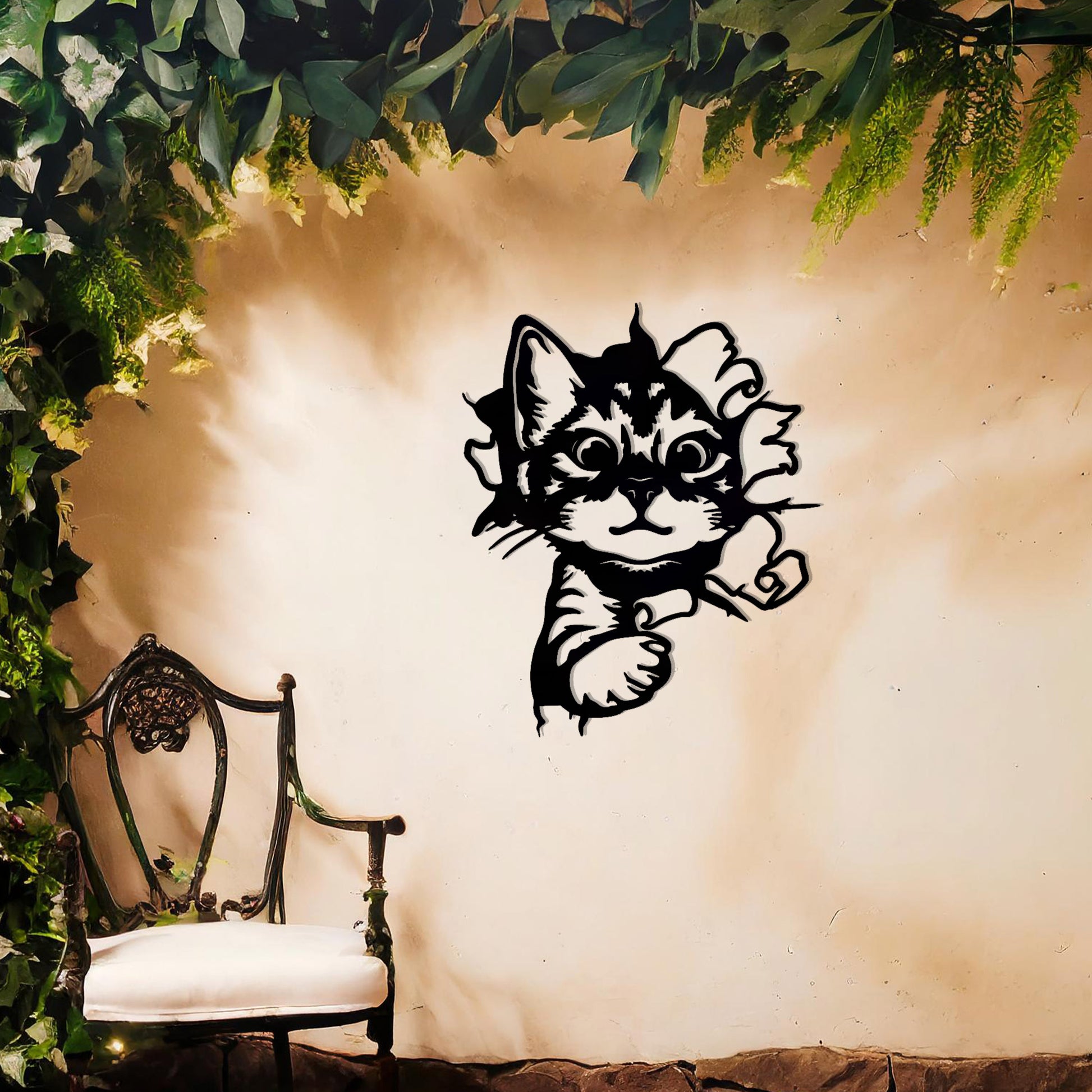 This image showcases a charming metal wall art design of a kitten peeking out from a tear in the wall. The cat's playful and curious expression adds a sense of warmth and whimsy, making it a delightful addition to any space, especially for animal lovers.