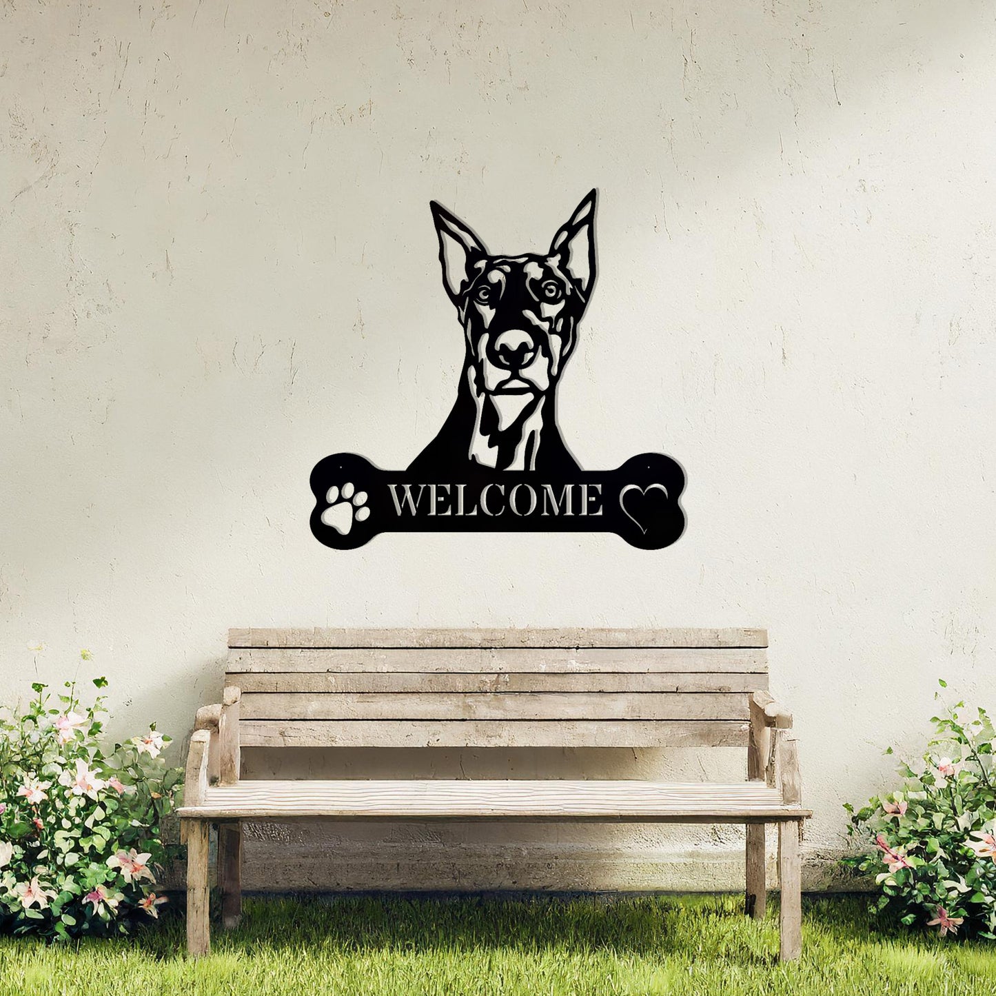 Metal Doberman dog design with a bone-shaped 'WELCOME' text and paw prints, perfect for adding a strong and welcoming touch to entryways or outdoor spaces.