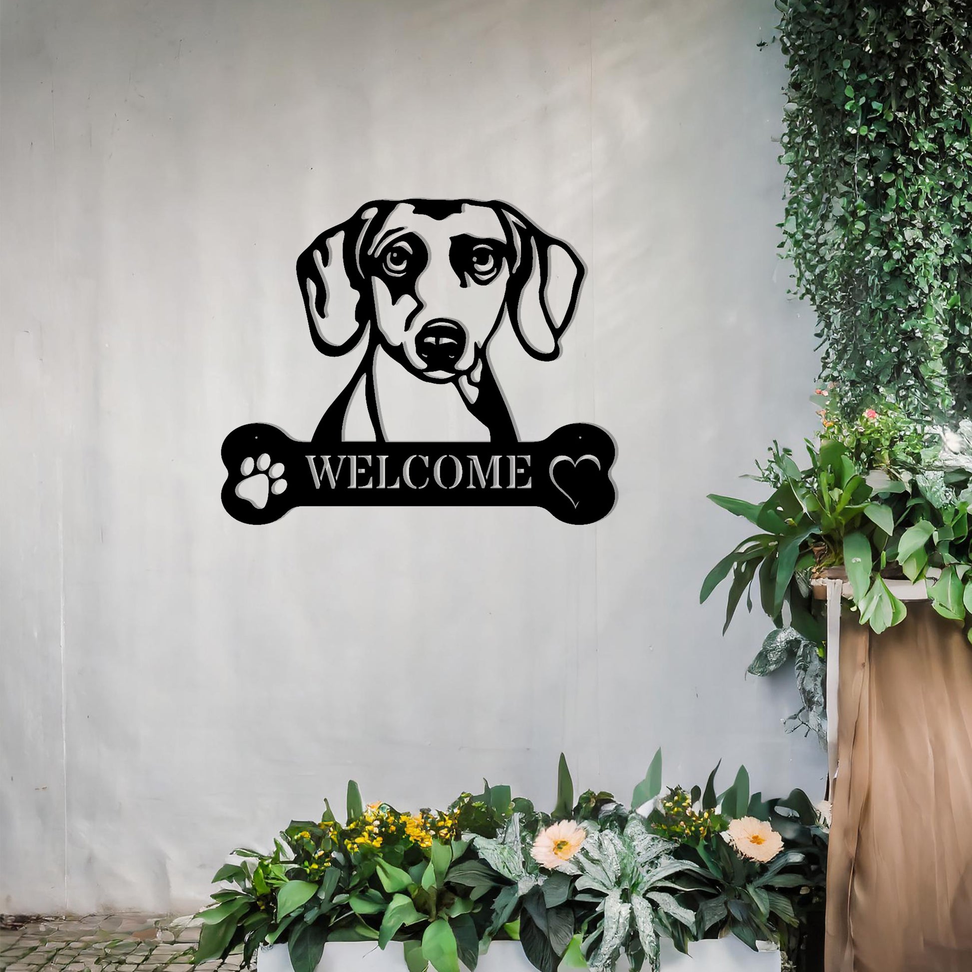 Metal Dachshund dog design with a bone-shaped 'WELCOME' text and paw prints, perfect for adding a charming and welcoming touch to entryways or outdoor spaces.