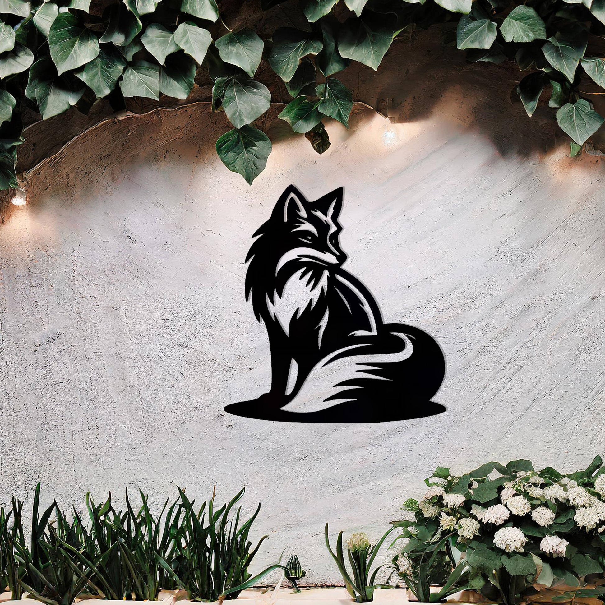 This metal wall art design depicts a sitting fox, elegantly turned to the side, showcasing its bushy tail and graceful silhouette. The minimalist yet detailed cutout enhances the fox's serene and poised demeanor, adding a touch of sophistication to any space.