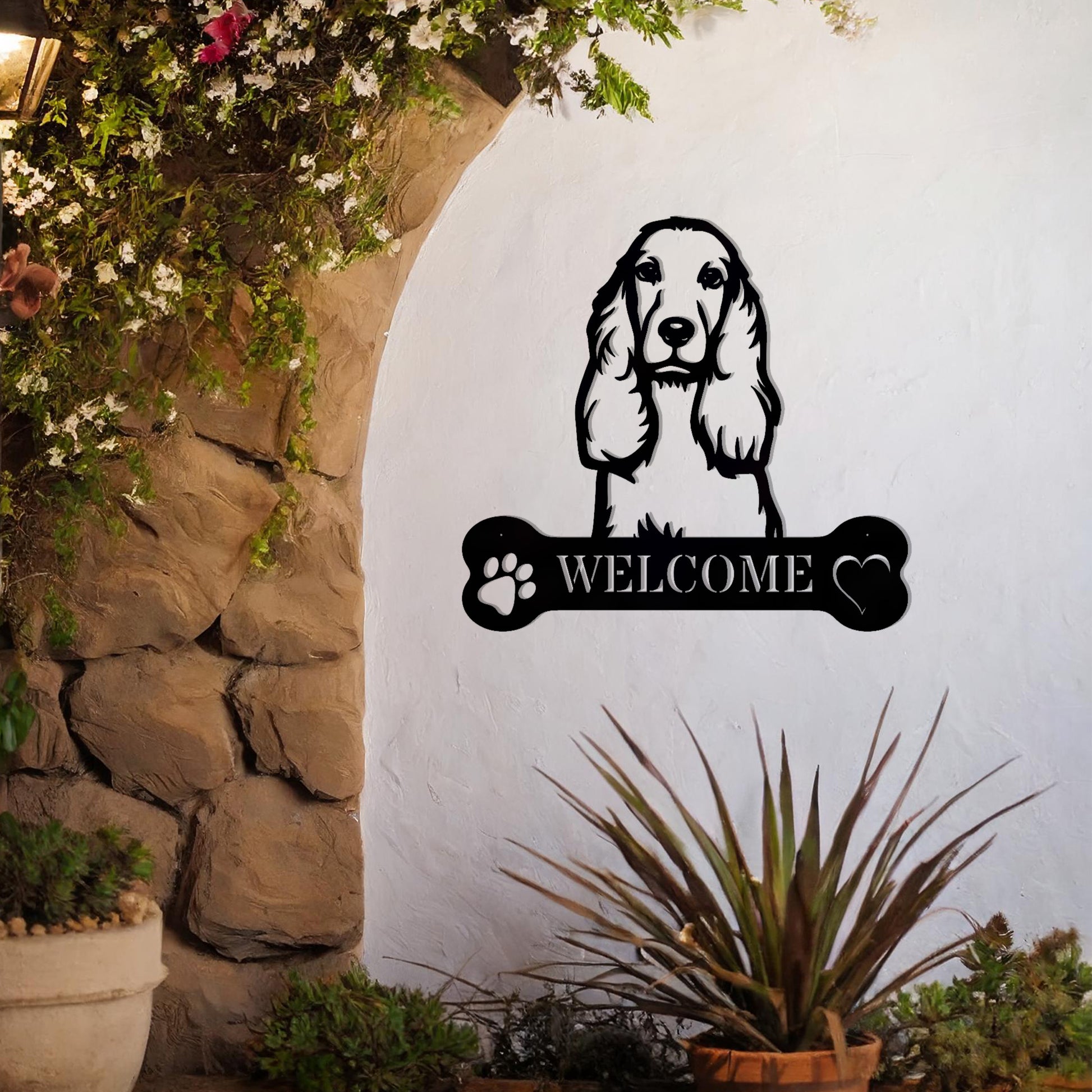 Metal Cocker Spaniel dog design with a bone-shaped 'WELCOME' text and paw prints, perfect for adding a friendly and welcoming touch to entryways or outdoor spaces.