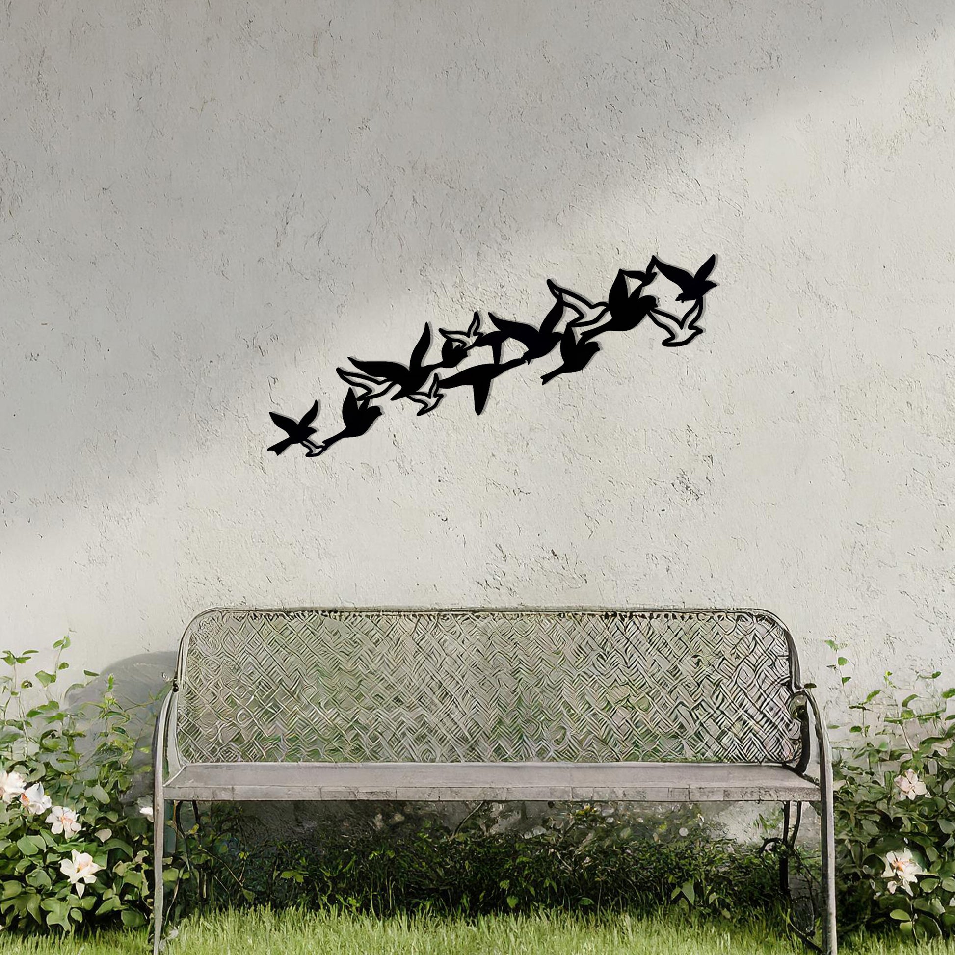 This design features a flock of birds in graceful flight, arranged dynamically to create a sense of motion and freedom. The minimalist silhouette adds an elegant touch, perfect for enhancing any wall space with a nature-inspired aesthetic.