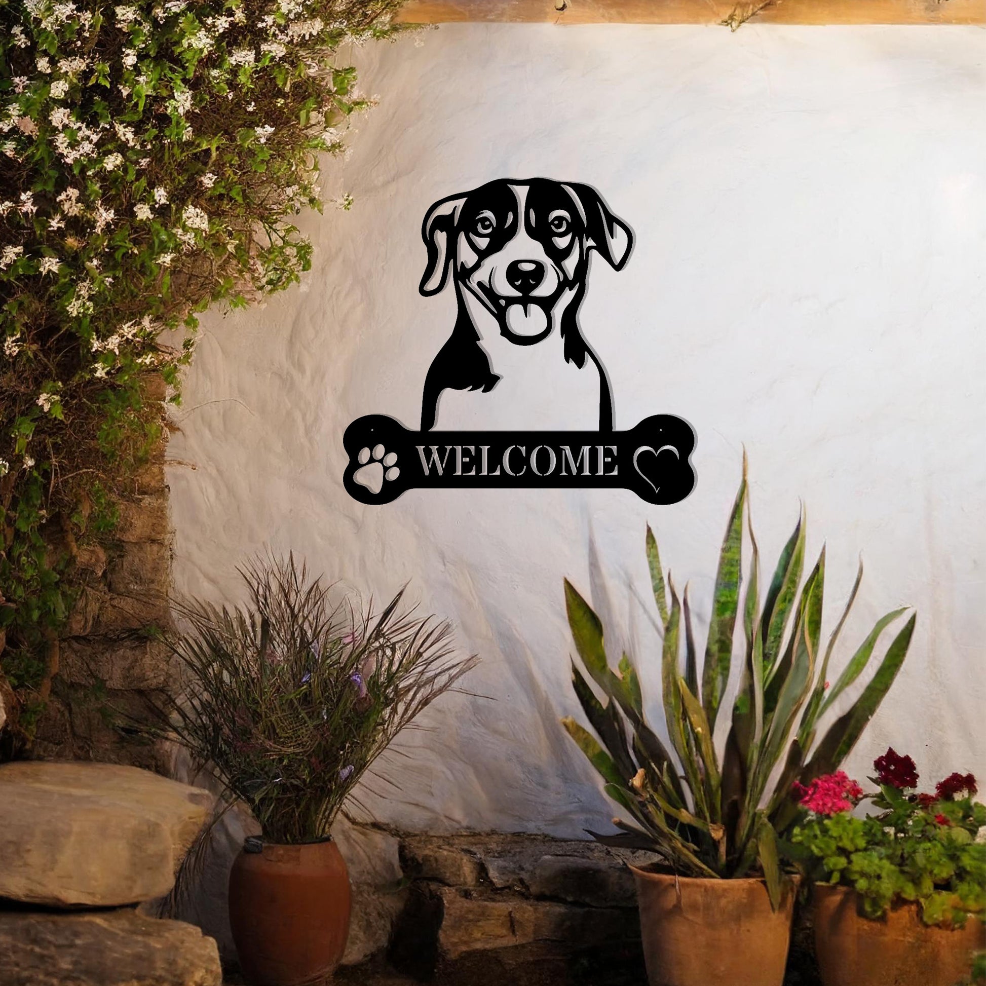 Metal Jack Russell Terrier dog design with a bone-shaped 'WELCOME' text and paw prints, perfect for adding a cheerful, welcoming touch to entryways or outdoor spaces.