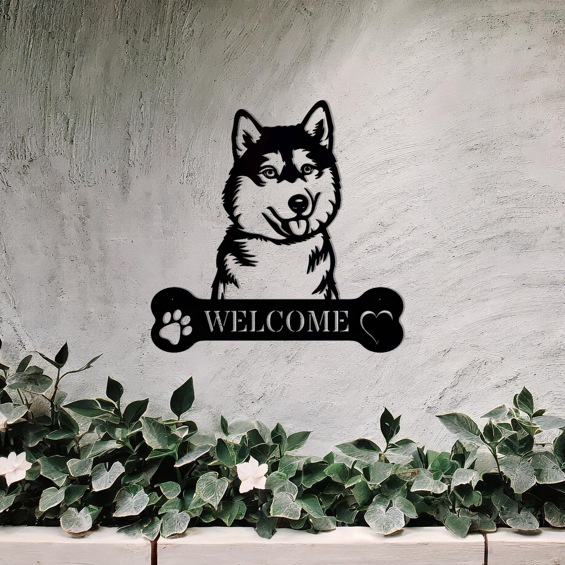 Metal Siberian Husky dog design with a bone-shaped 'WELCOME' text and paw prints, perfect for adding a friendly and welcoming touch to entryways or outdoor spaces.