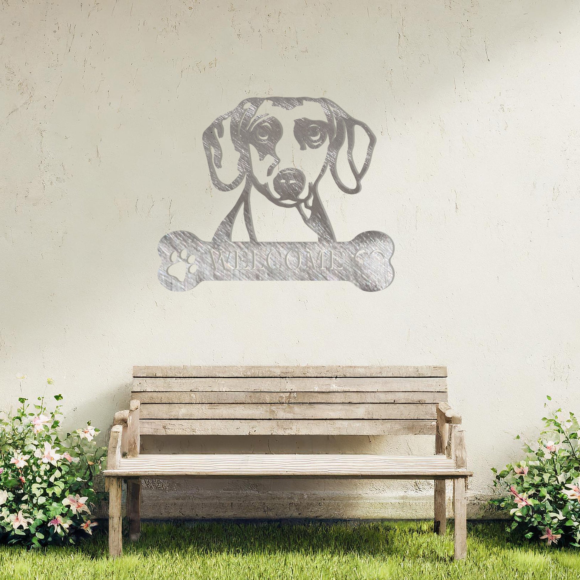 Metal Dachshund dog design with a bone-shaped 'WELCOME' text and paw prints, perfect for adding a charming and welcoming touch to entryways or outdoor spaces.