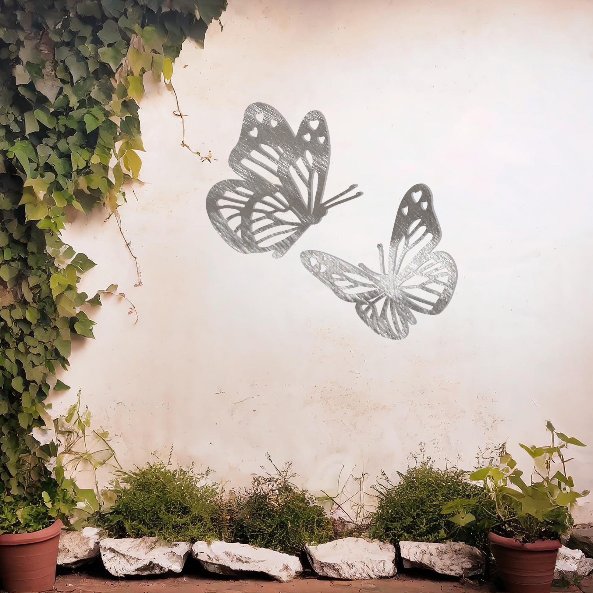 This design showcases a pair of intricately detailed butterflies in flight, their delicate wings adorned with heart-shaped accents. A charming addition to any space, celebrating the beauty of nature and the grace of butterflies.