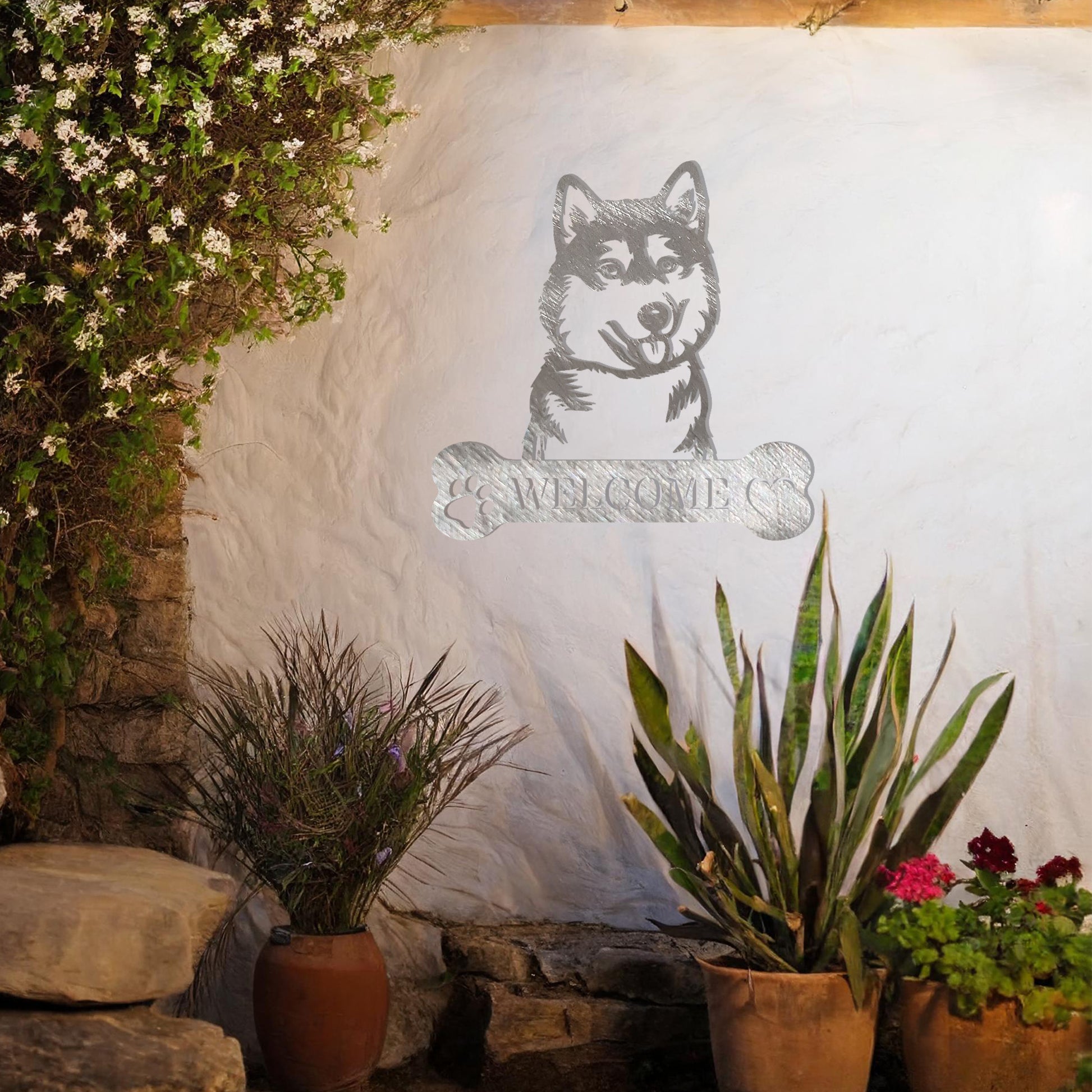 Metal Siberian Husky dog design with a bone-shaped 'WELCOME' text and paw prints, perfect for adding a friendly and welcoming touch to entryways or outdoor spaces.