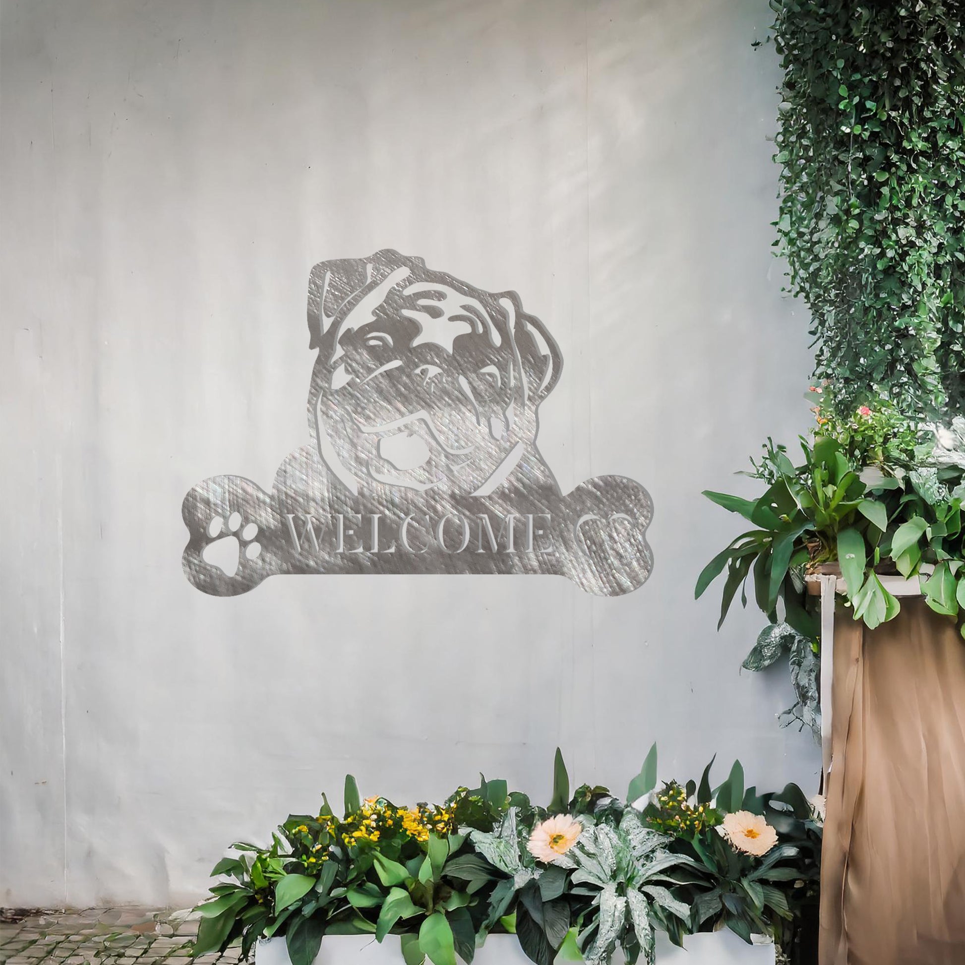 Metal Pug dog design with a bone-shaped 'WELCOME' text and paw prints, perfect for adding a friendly and welcoming touch to entryways or outdoor spaces.