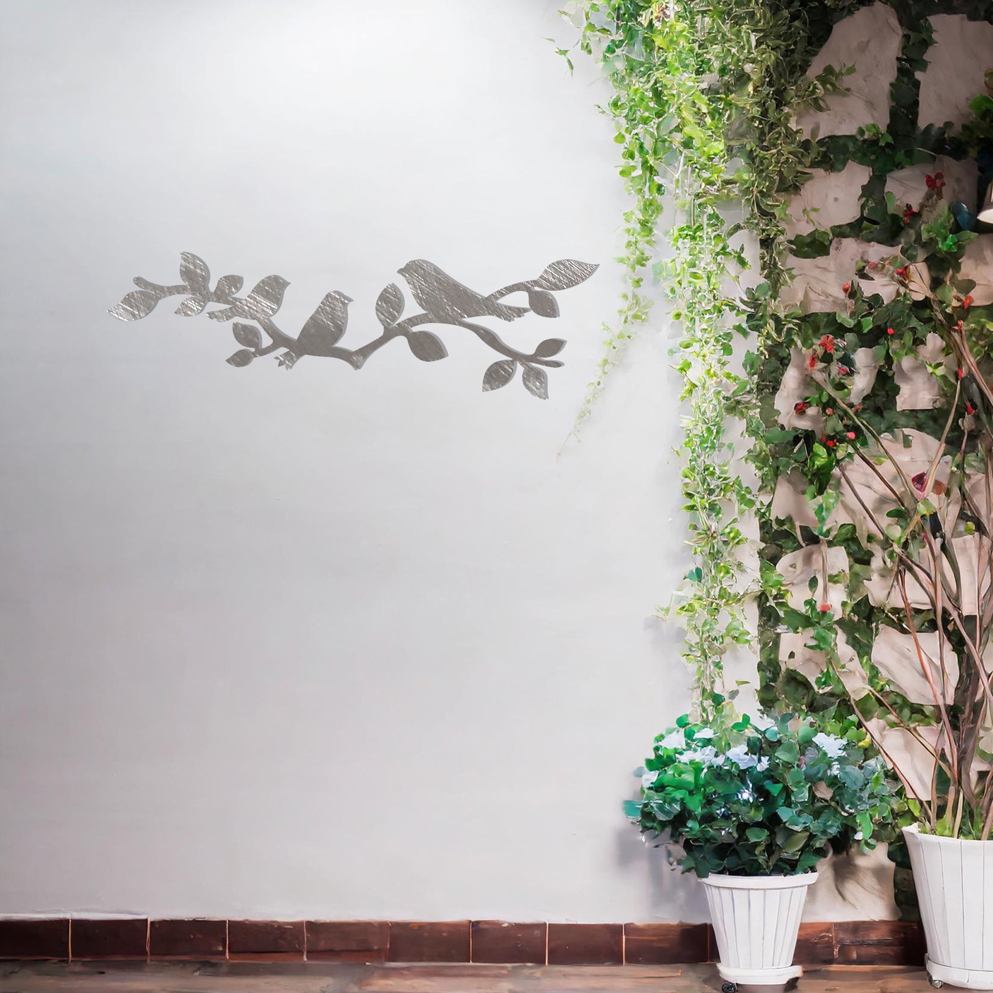This design features a group of birds perched gracefully on a leafy branch, creating a serene and natural aesthetic. The intricate silhouettes of the birds and leaves make this artwork ideal for adding a touch of nature-inspired elegance to any wall.