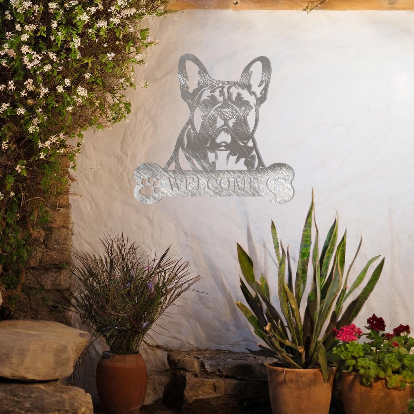 Metal French Bulldog design with a bone-shaped 'WELCOME' text and paw prints, perfect for adding a charming and welcoming touch to entryways or outdoor spaces.