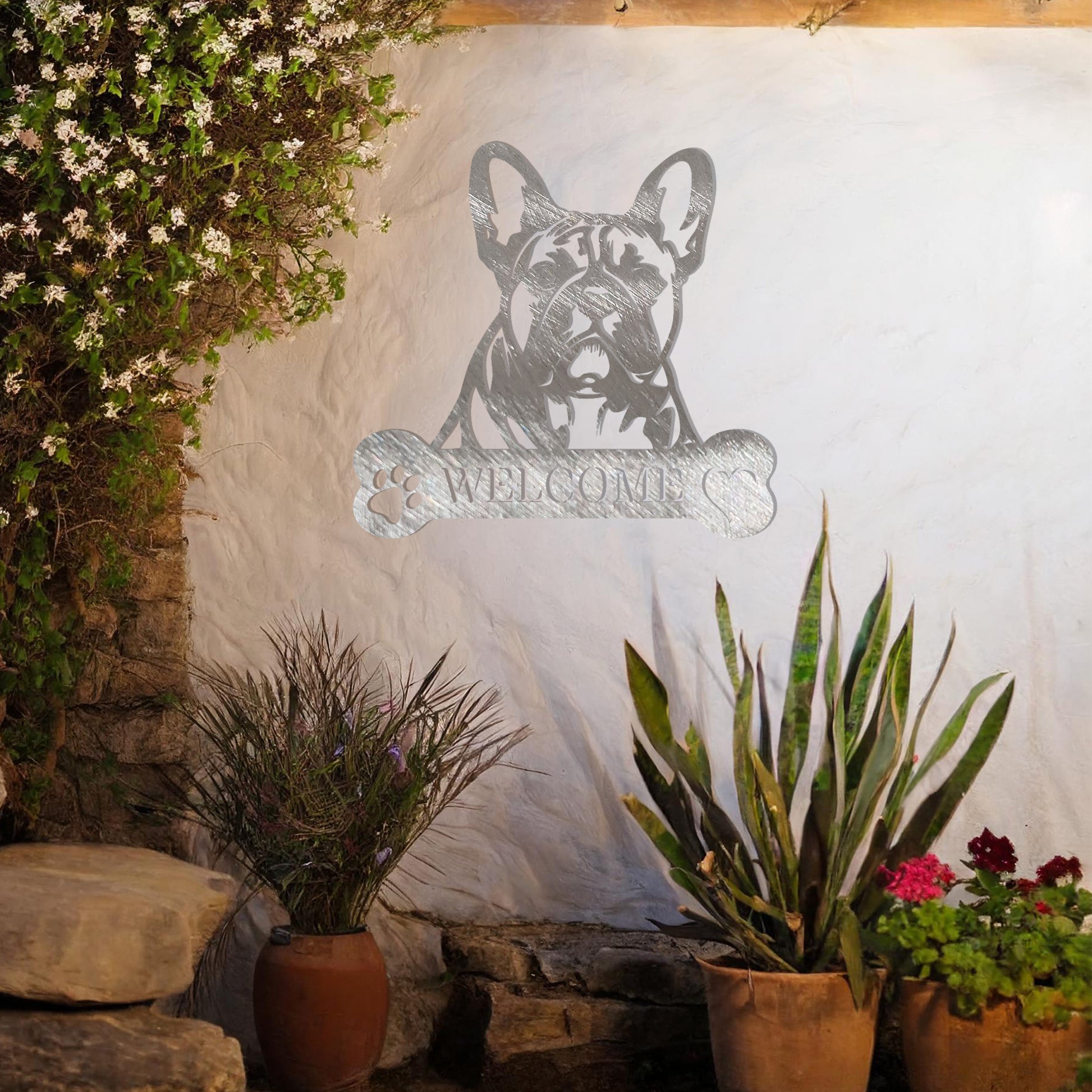 Metal French Bulldog design with a bone-shaped 'WELCOME' text and paw prints, perfect for adding a charming and welcoming touch to entryways or outdoor spaces.