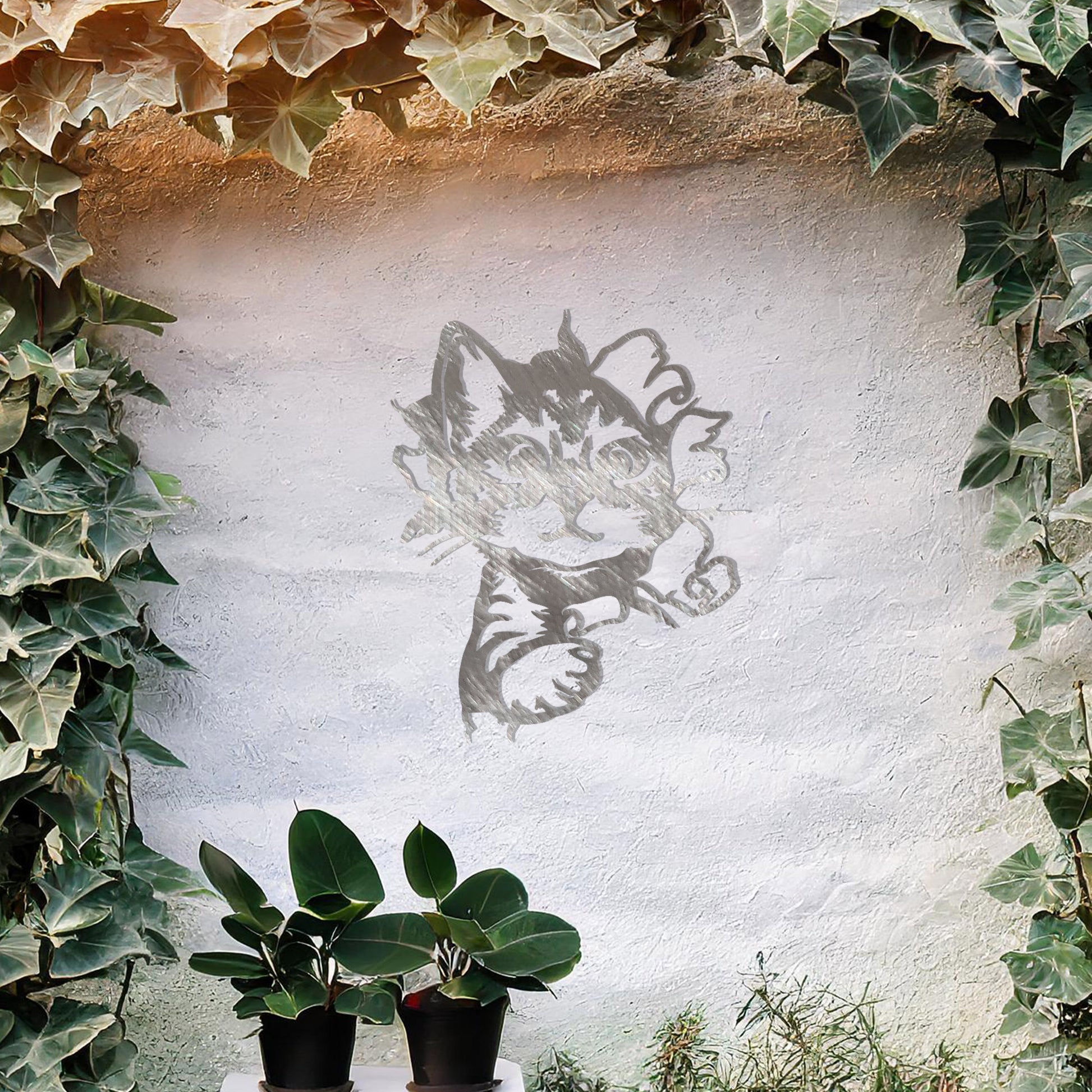 This image showcases a charming metal wall art design of a kitten peeking out from a tear in the wall. The cat's playful and curious expression adds a sense of warmth and whimsy, making it a delightful addition to any space, especially for animal lovers.