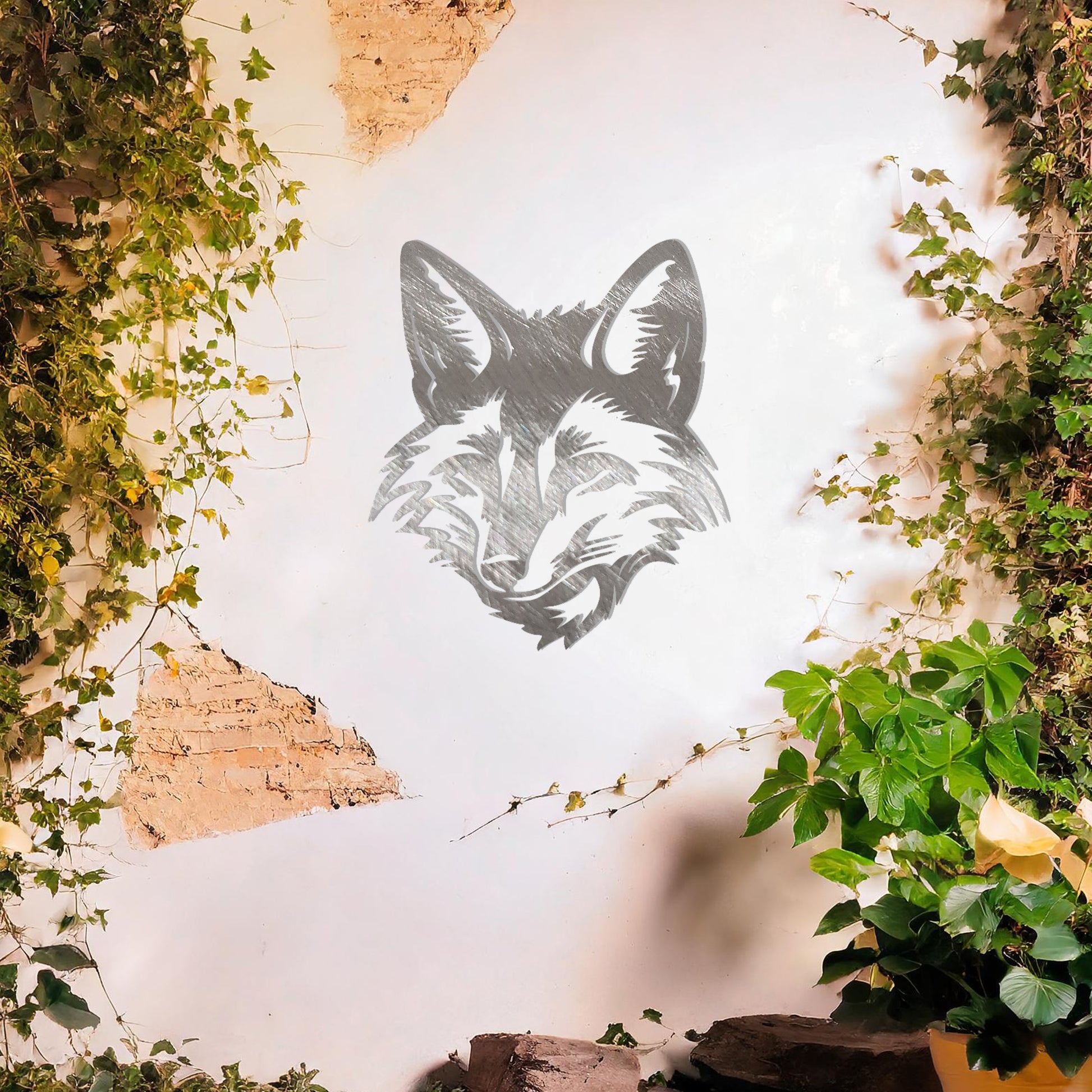 This is a sleek and artistic metal wall art design showcasing the face of a fox, intricately crafted to highlight its cunning expression and sharp features. Perfect for adding a stylish, nature-inspired element to your space.