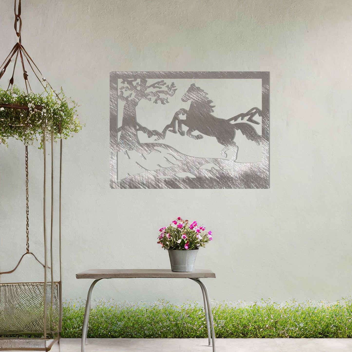 This wall art design depicts a majestic horse rearing up on a hillside, surrounded by a tree and mountain scenery, all encapsulated within a rectangular frame. A perfect addition for nature lovers and equestrian enthusiasts.