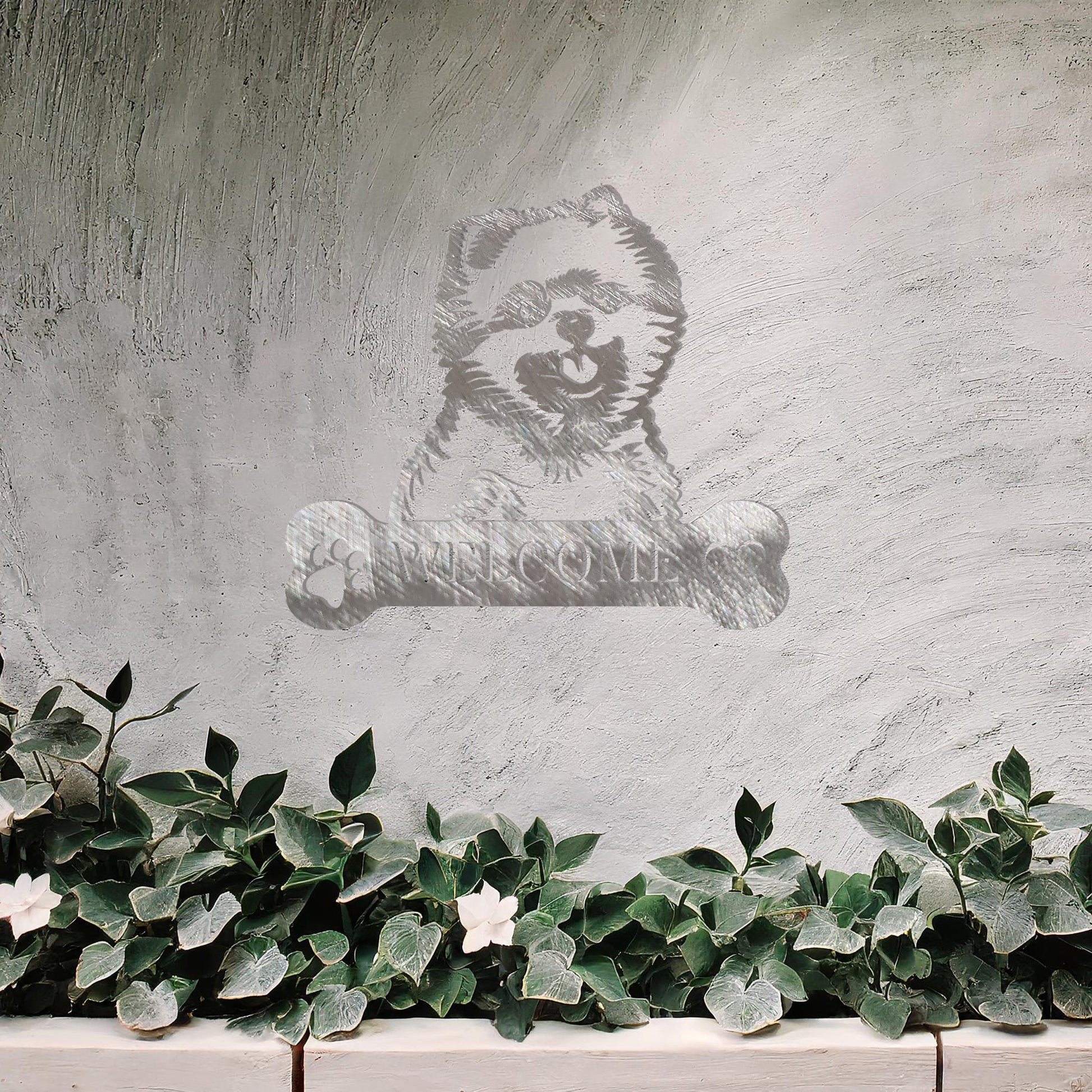 Metal Pomeranian dog design with a bone-shaped 'WELCOME' text and paw prints, perfect for adding a friendly and welcoming touch to entryways or outdoor spaces.