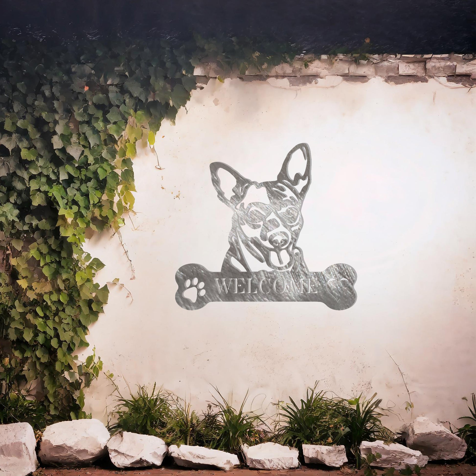 Metal Chihuahua dog design with a bone-shaped 'WELCOME' text and paw prints, perfect for adding a cute and welcoming touch to entryways or outdoor spaces.