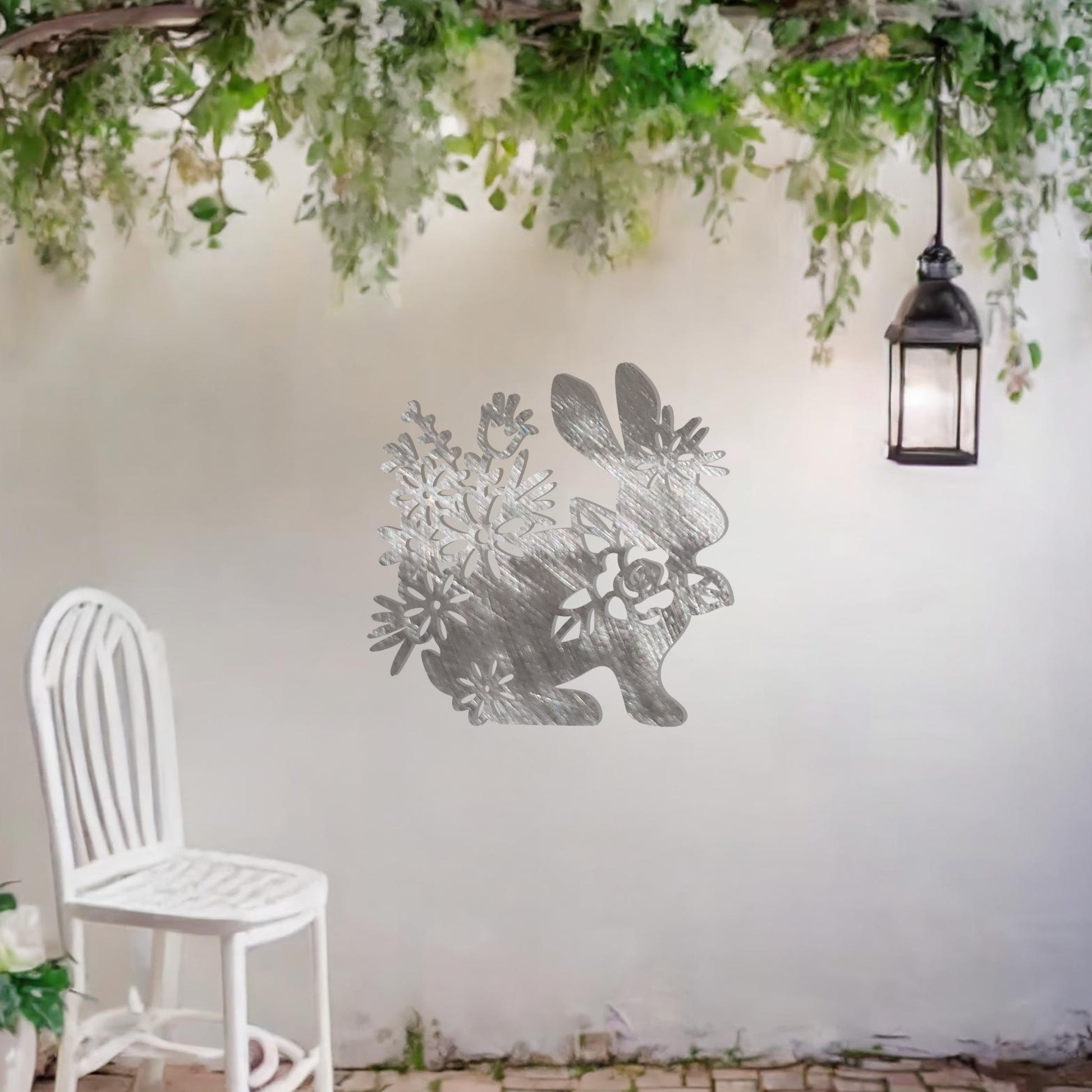 This design showcases a rabbit surrounded by an intricate arrangement of flowers, blending nature's elegance with the charm of wildlife. The delicate floral details enhance the overall beauty of the piece.