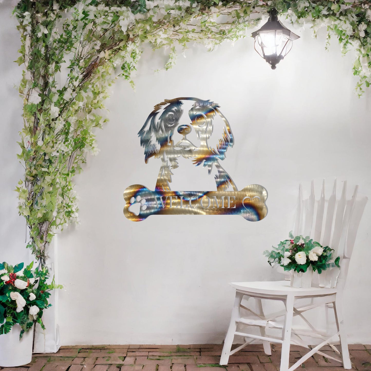 Metal Cavalier King Charles Spaniel dog design with a bone-shaped 'WELCOME' text and paw prints, perfect for adding a charming and welcoming touch to entryways or outdoor spaces.