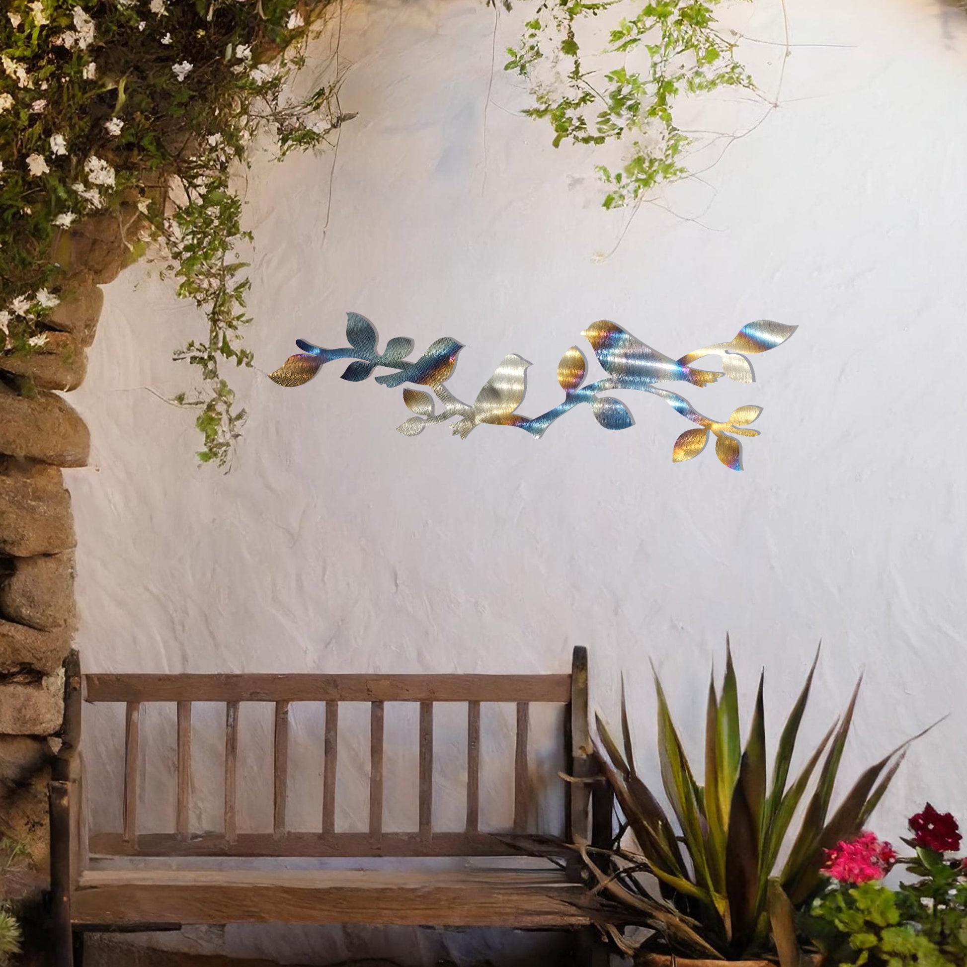 This design features a group of birds perched gracefully on a leafy branch, creating a serene and natural aesthetic. The intricate silhouettes of the birds and leaves make this artwork ideal for adding a touch of nature-inspired elegance to any wall.