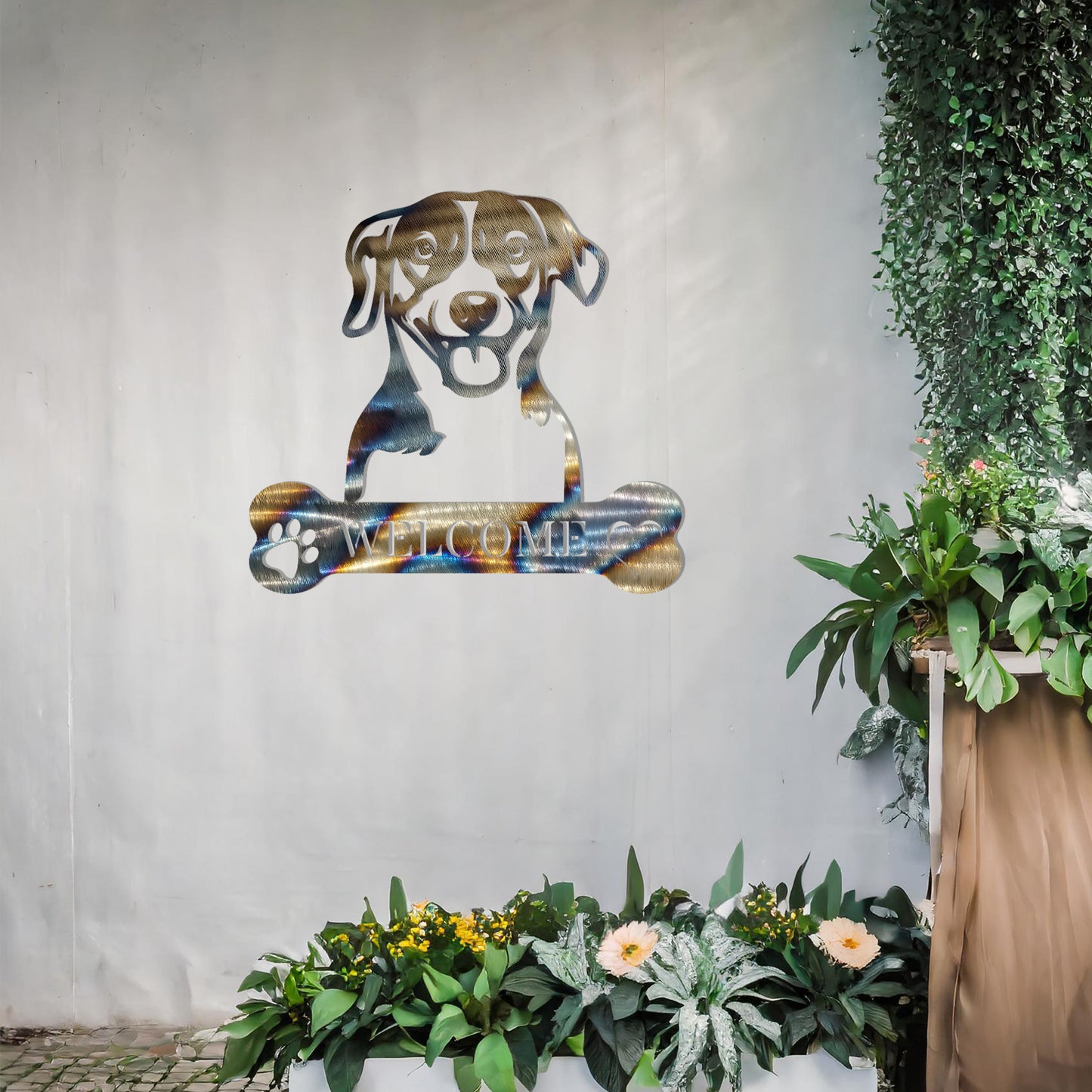 Metal Jack Russell Terrier dog design with a bone-shaped 'WELCOME' text and paw prints, perfect for adding a cheerful, welcoming touch to entryways or outdoor spaces.