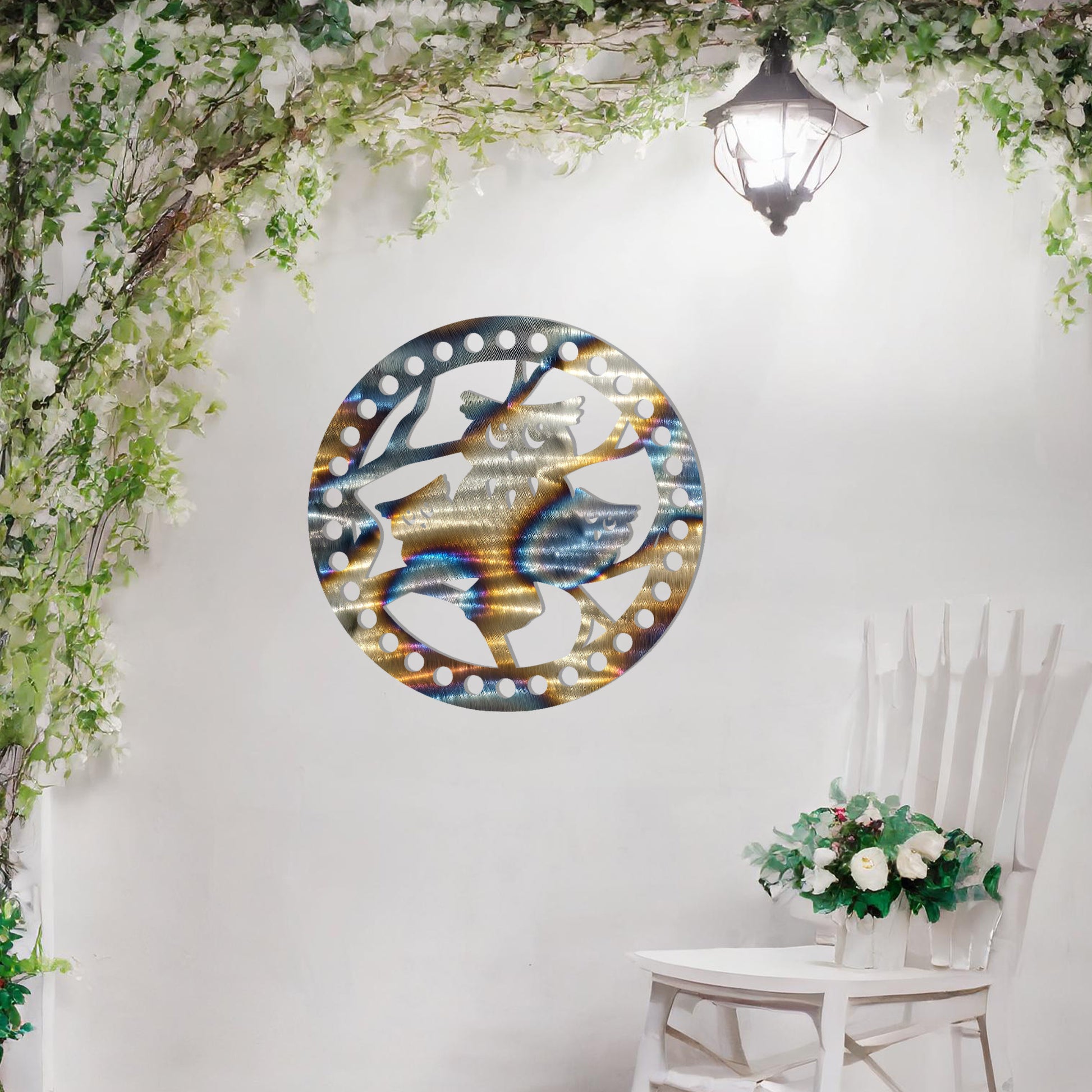 This design portrays a charming family of owls perched within a circular frame. The intricate details and playful expressions add a whimsical touch, making it an ideal piece for nature lovers or those seeking a quirky and unique wall decoration.