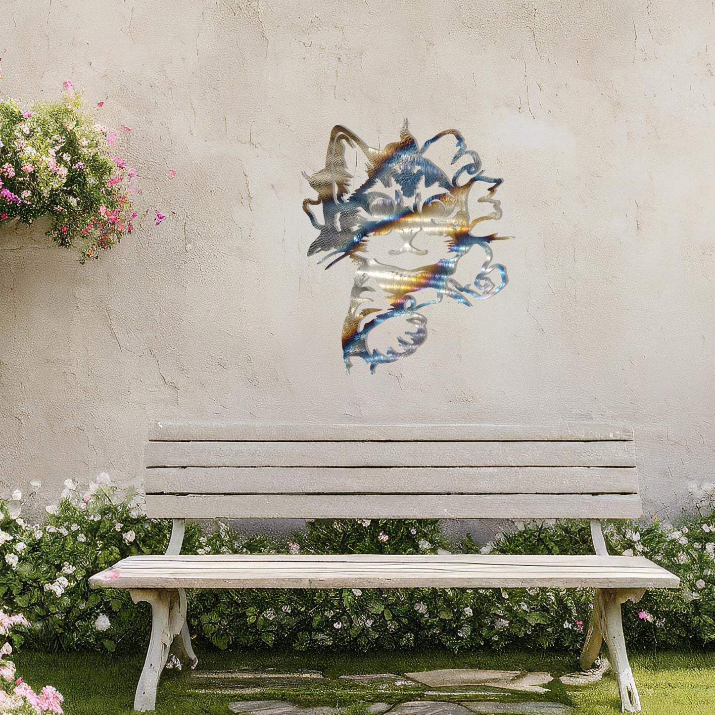 This image showcases a charming metal wall art design of a kitten peeking out from a tear in the wall. The cat's playful and curious expression adds a sense of warmth and whimsy, making it a delightful addition to any space, especially for animal lovers.
