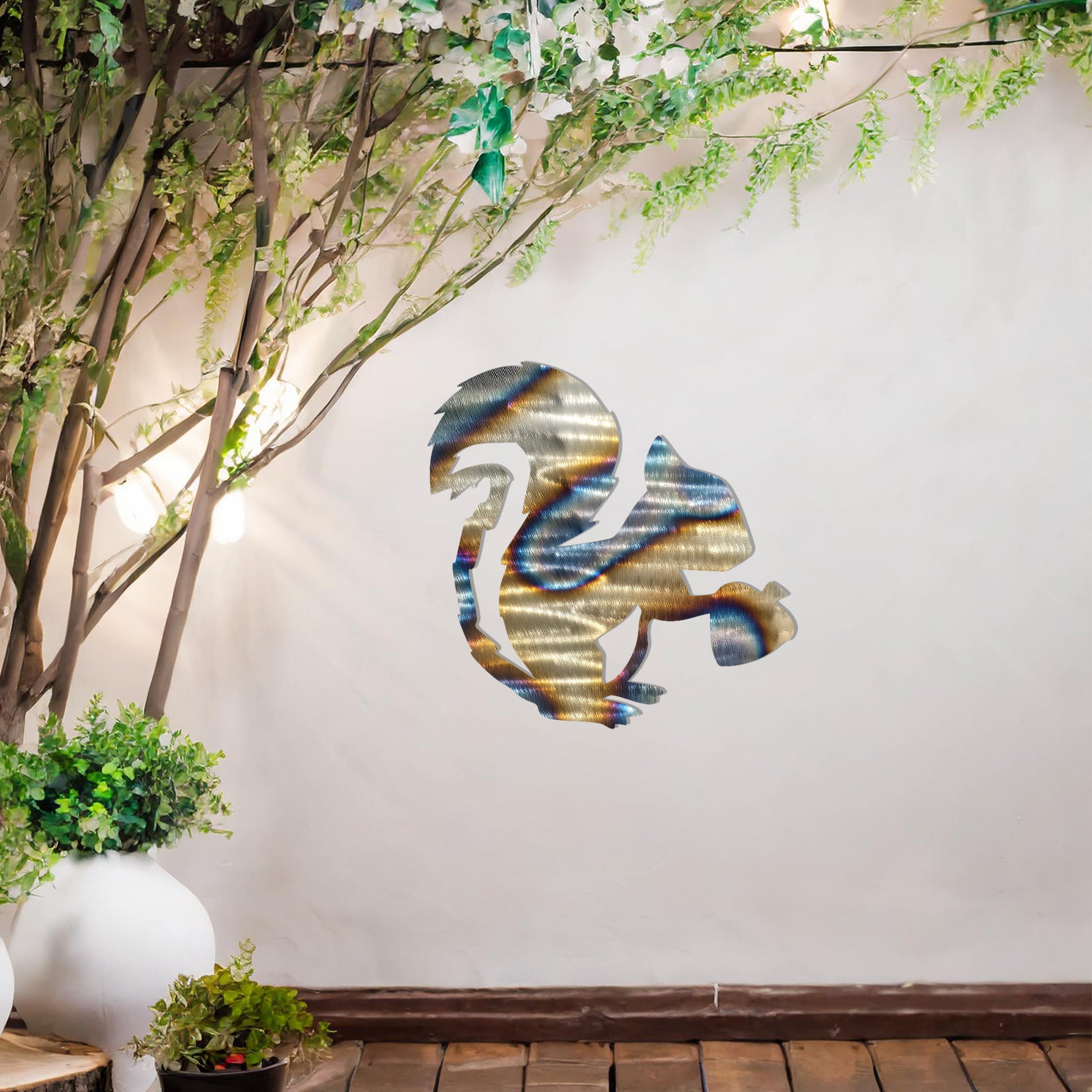 This design features a squirrel holding an acorn. The clean lines and intricate details of the animal's silhouette capture its playful and curious nature.