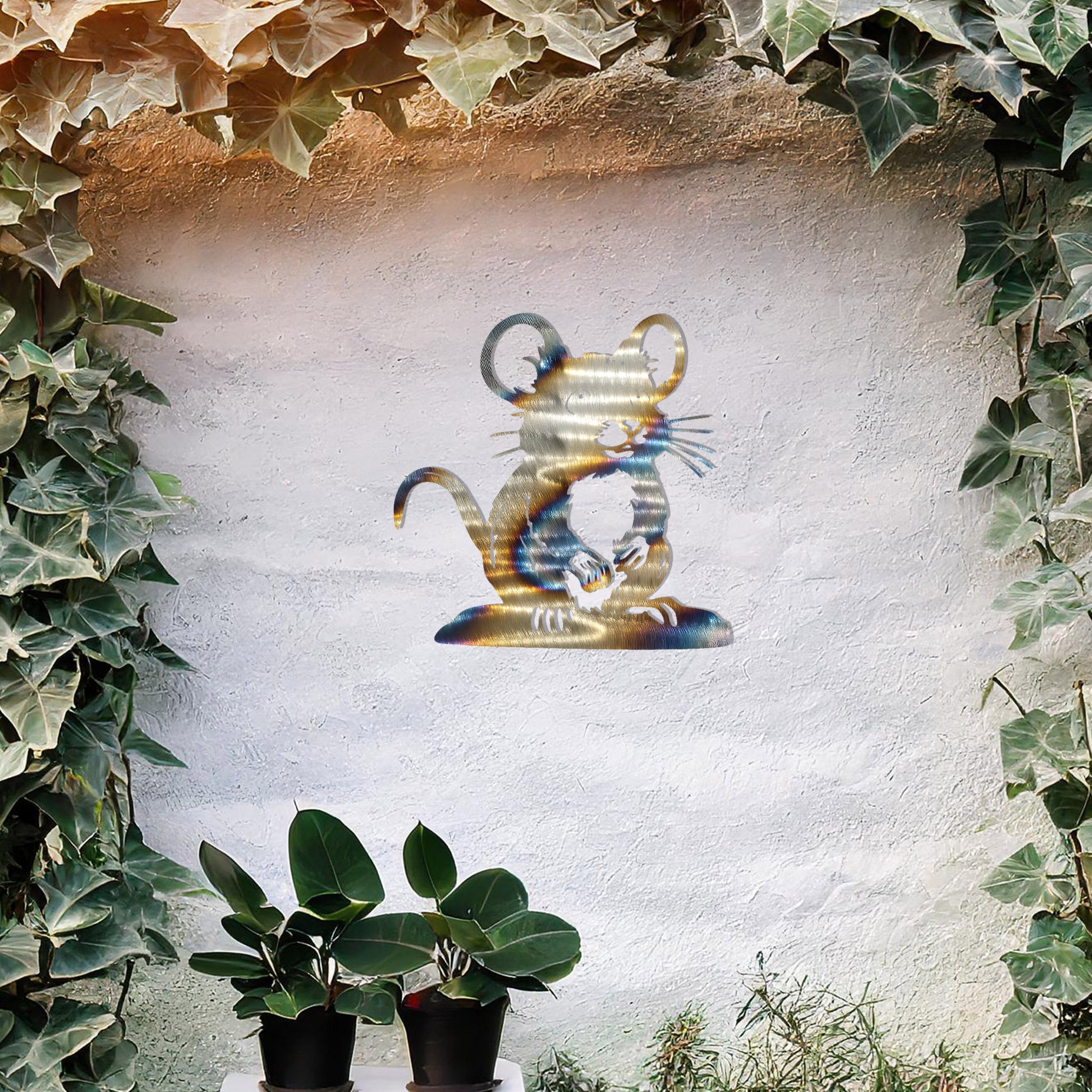 A delightful metal wall art piece featuring a whimsical mouse perched on a platform, adding a playful charm to a neutral wall. Perfect for modern garden decor, this design blends seamlessly with lush greenery and an outdoor water feature.