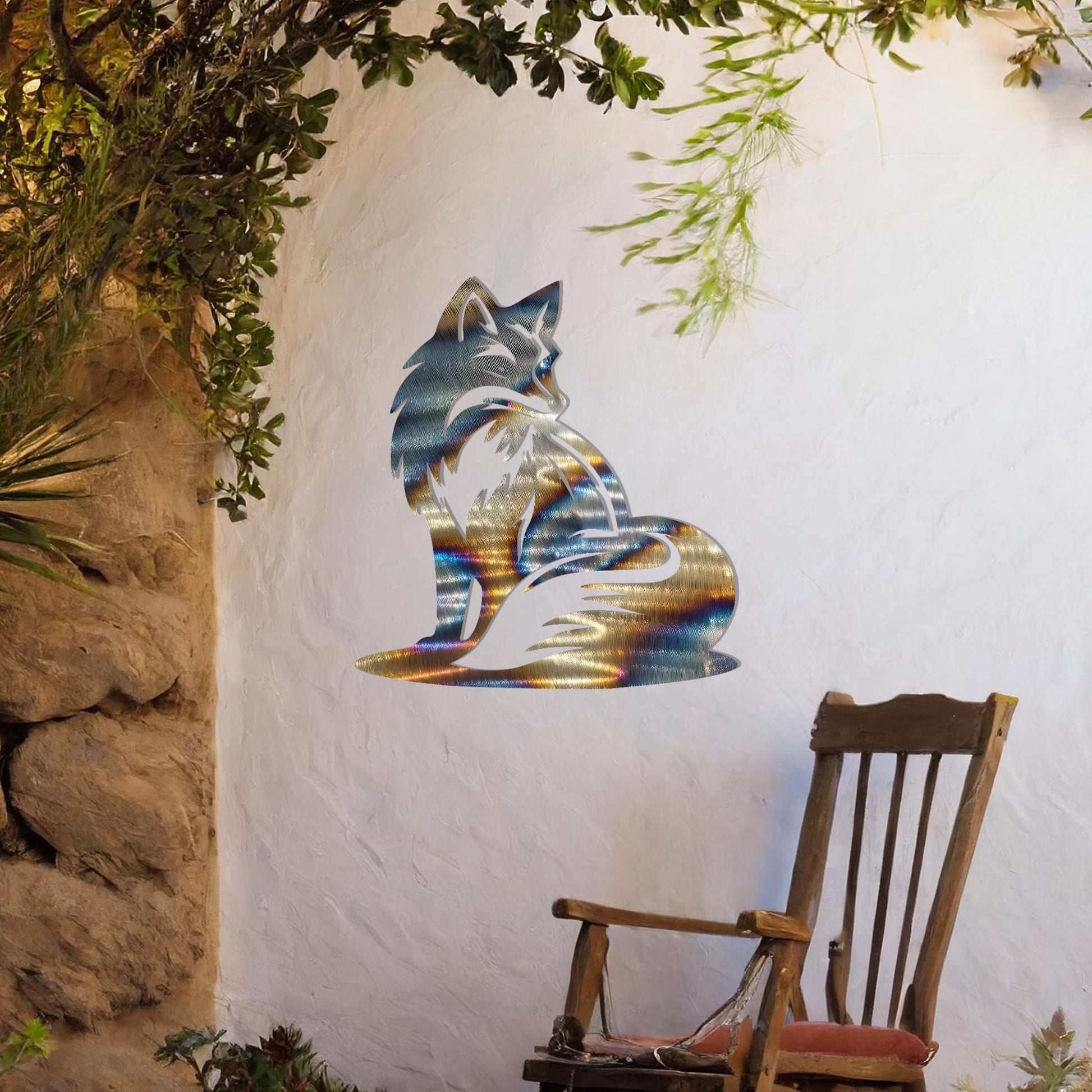 This metal wall art design depicts a sitting fox, elegantly turned to the side, showcasing its bushy tail and graceful silhouette. The minimalist yet detailed cutout enhances the fox's serene and poised demeanor, adding a touch of sophistication to any space.