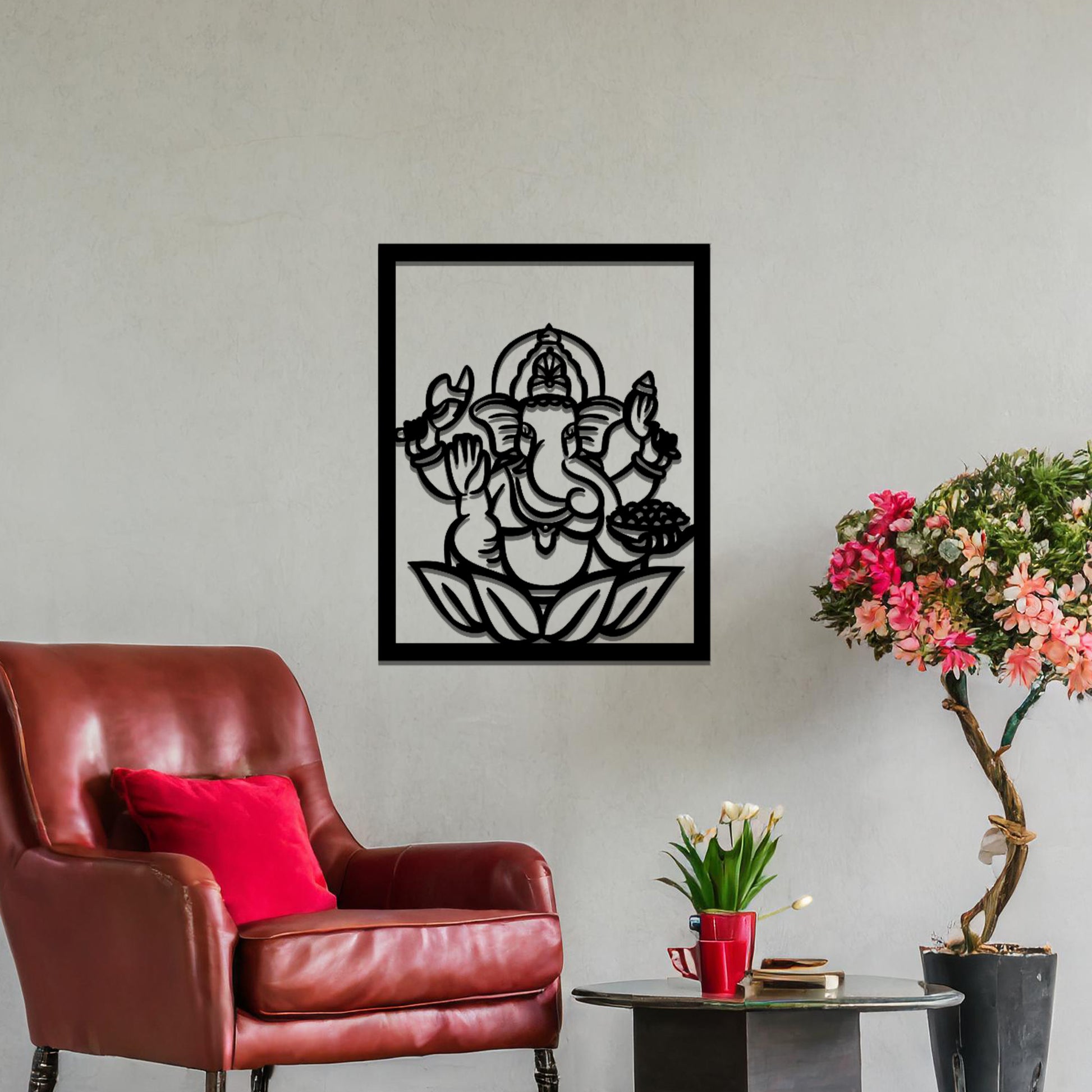 Metal wall art featuring a rectangular design of Lord Ganesha sitting on a lotus, showcasing intricate detailing of the deity's form and symbolic elements, mounted on a neutral wall within modern room decor. The craftsmanship adds a spiritual and artistic touch to the space.